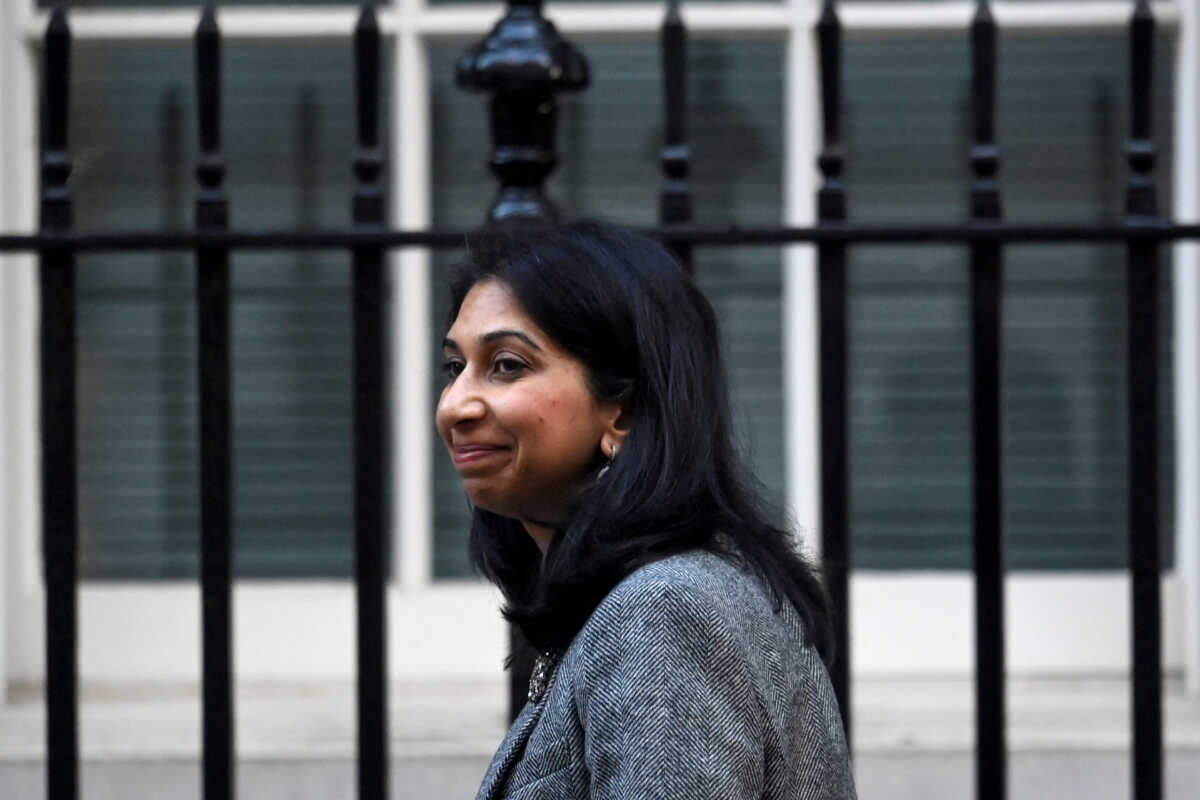 Britain's Secretary of State for the Home Department Suella Braverman walks outside Number 10 Downing Street in London, Britain, October 18, 2022. REUTERS
