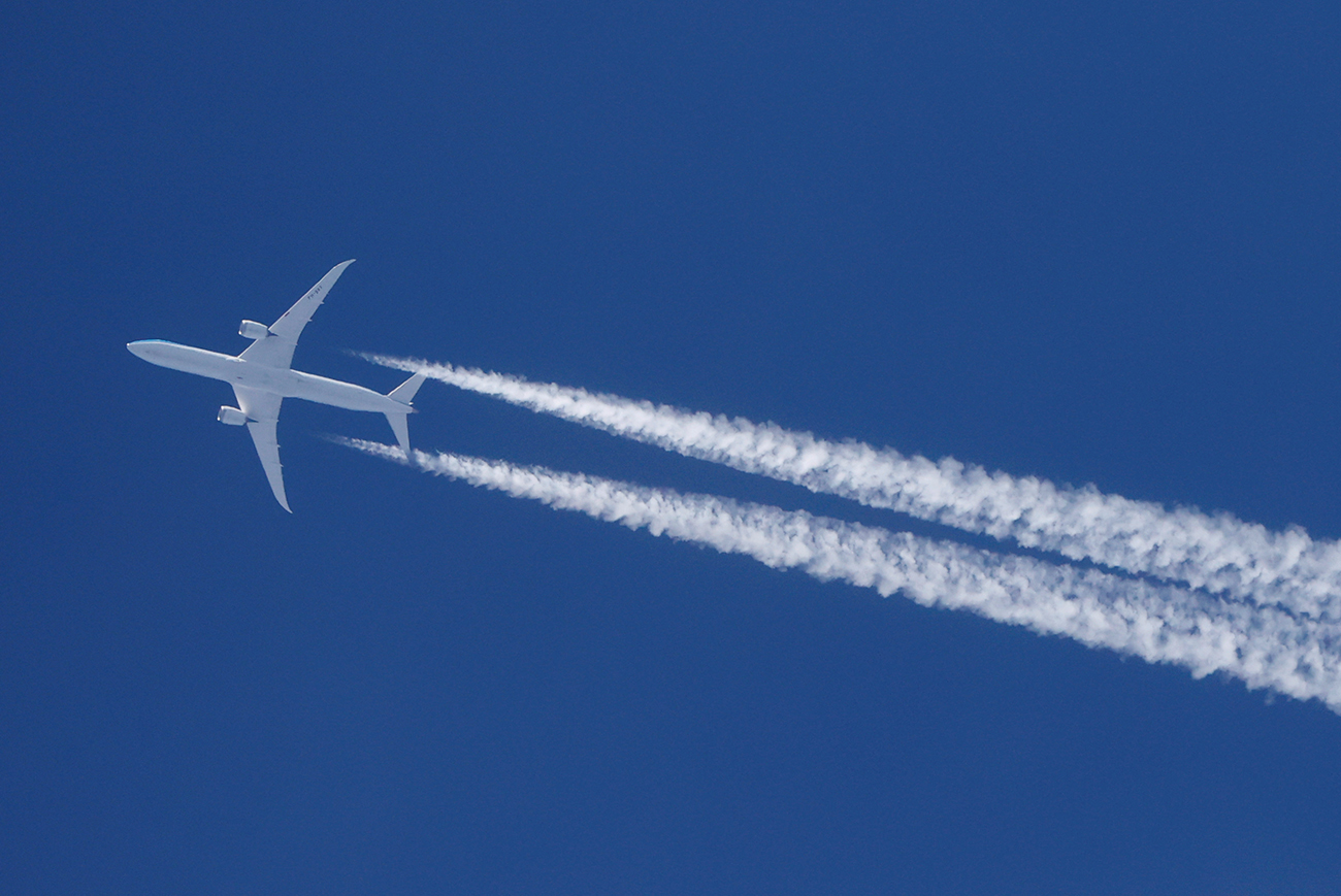 An aeroplane flies over Manchester following the outbreak of the coronavirus disease (COVID-19), Manchester, Britain, May 5, 2020. REUTERS