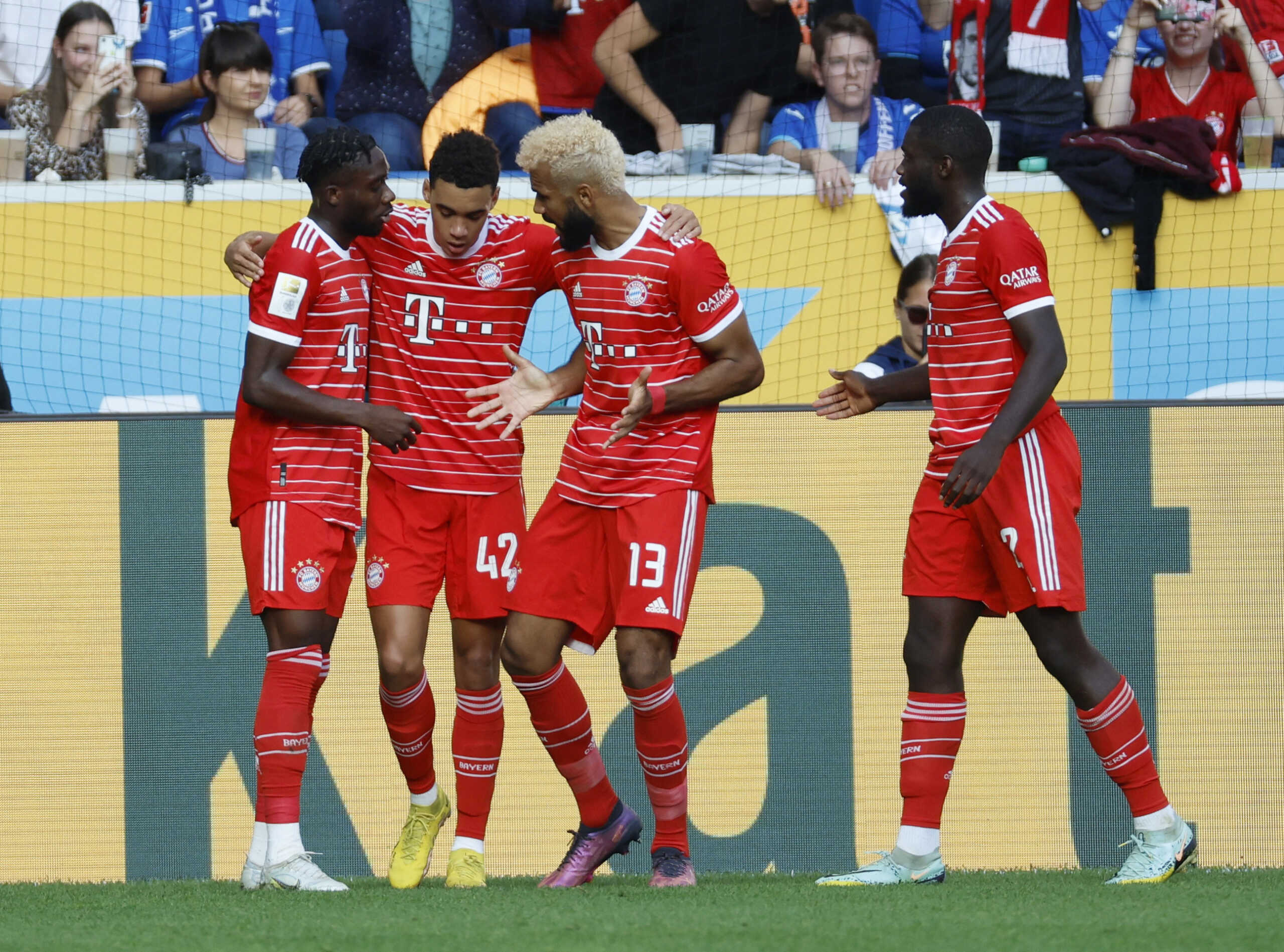 Soccer Football - Bundesliga - TSG 1899 Hoffenheim v Bayern Munich - PreZero Arena, Sinsheim, Germany - October 22, 2022 Bayern Munich's Jamal Musiala celebrates scoring their first goal with Alphonso Davies, Eric Maxim Choupo-Moting and Dayot Upamecano REUTERS