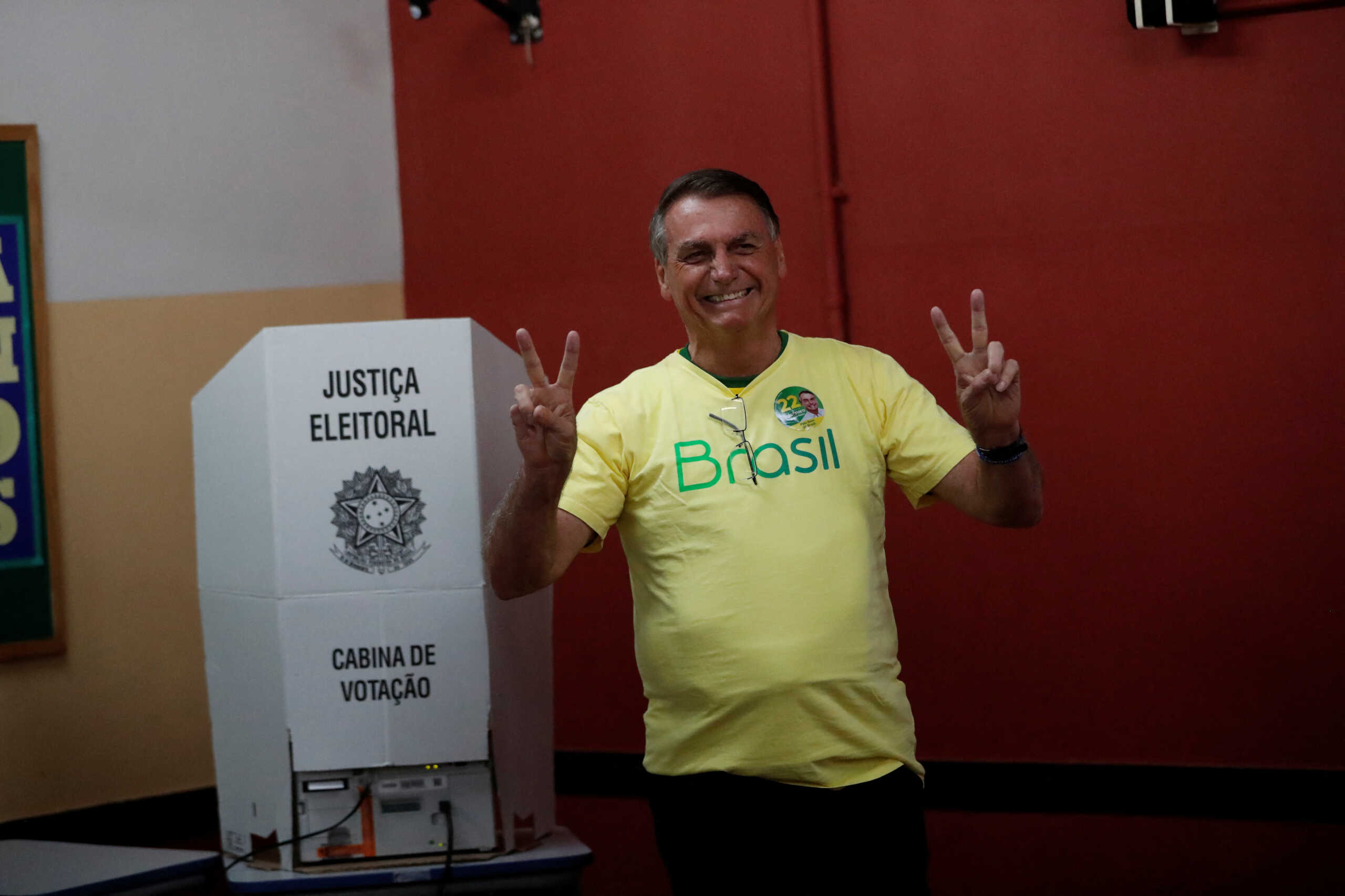 Brazil's President and presidential candidate Jair Bolsonaro gestures as he votes during presidential election run-off, in Rio de Janeiro, Brazil October 30, 2022. Bruna Prado
