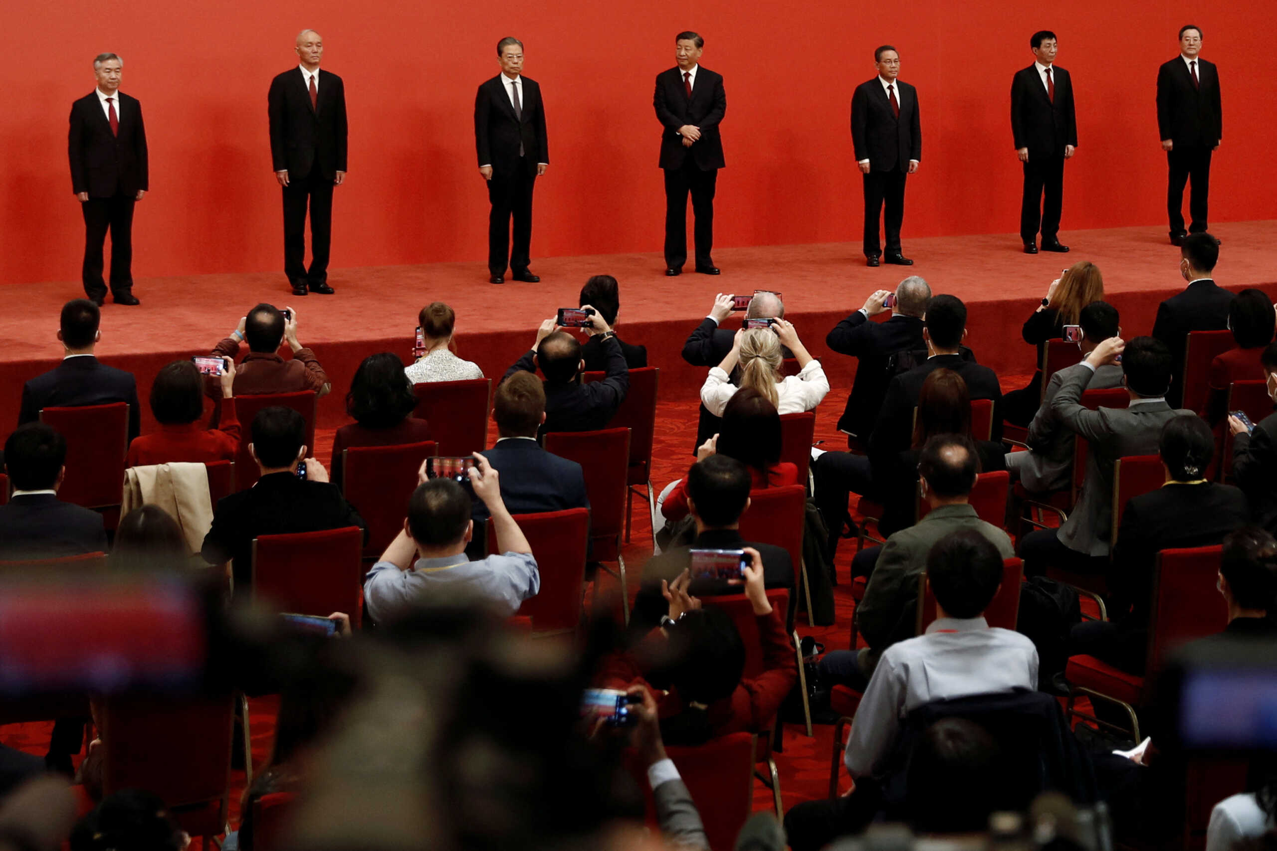 New Politburo Standing Committee members Xi Jinping, Li Qiang, Zhao Leji, Wang Huning, Cai Qi, Ding Xuexiang and Li Xi meet the media following the 20th National Congress of the Communist Party of China, at the Great Hall of the People in Beijing, China October 23, 2022. REUTERS