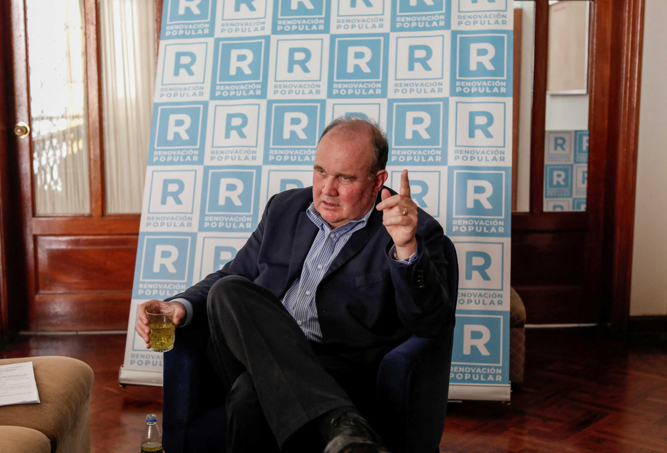 FILE PHOTO: Conservative Opus Dei businessman Rafael Lopez Aliaga talking to Reuters in Lima, Peru on March 12, 2021.  REUTERS