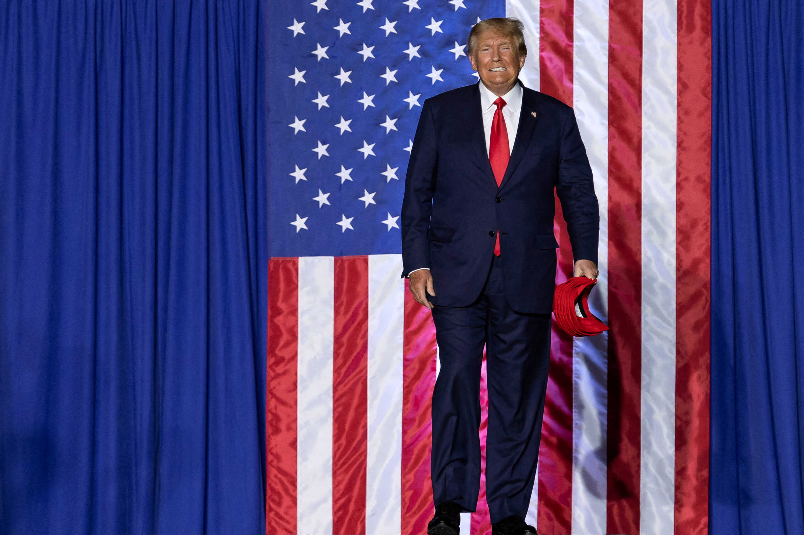 FILE PHOTO: Former U.S. president Donald Trump attends a rally ahead of the midterm elections, in Minden, Nevada, U.S., October 8, 2022.  REUTERS