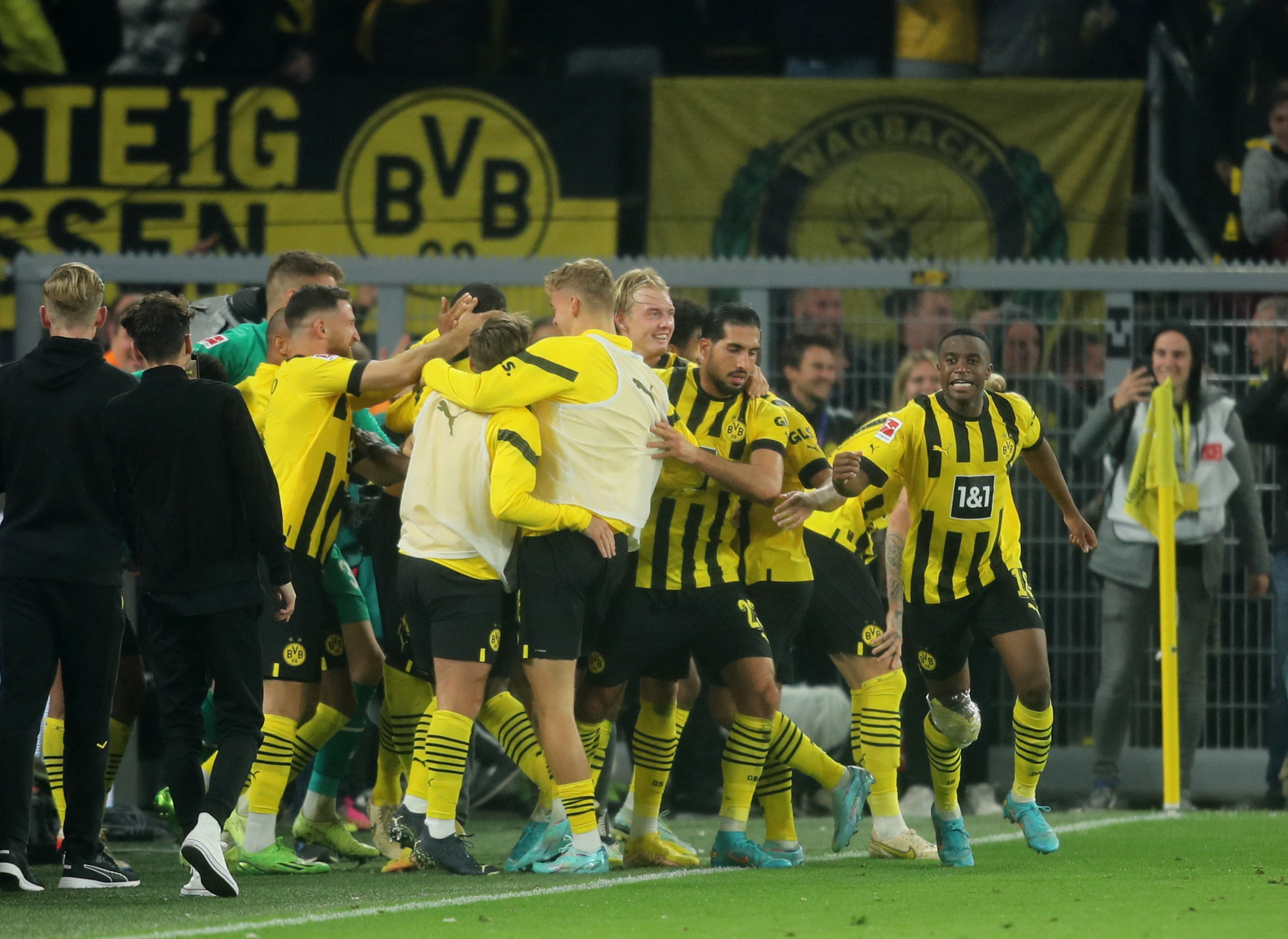 Soccer Football - Bundesliga - Borussia Dortmund v Bayern Munich - Signal Iduna Park, Dortmund, Germany - October 8, 2022 Borussia Dortmund players celebrate their second goal scored by Anthony Modeste REUTERS