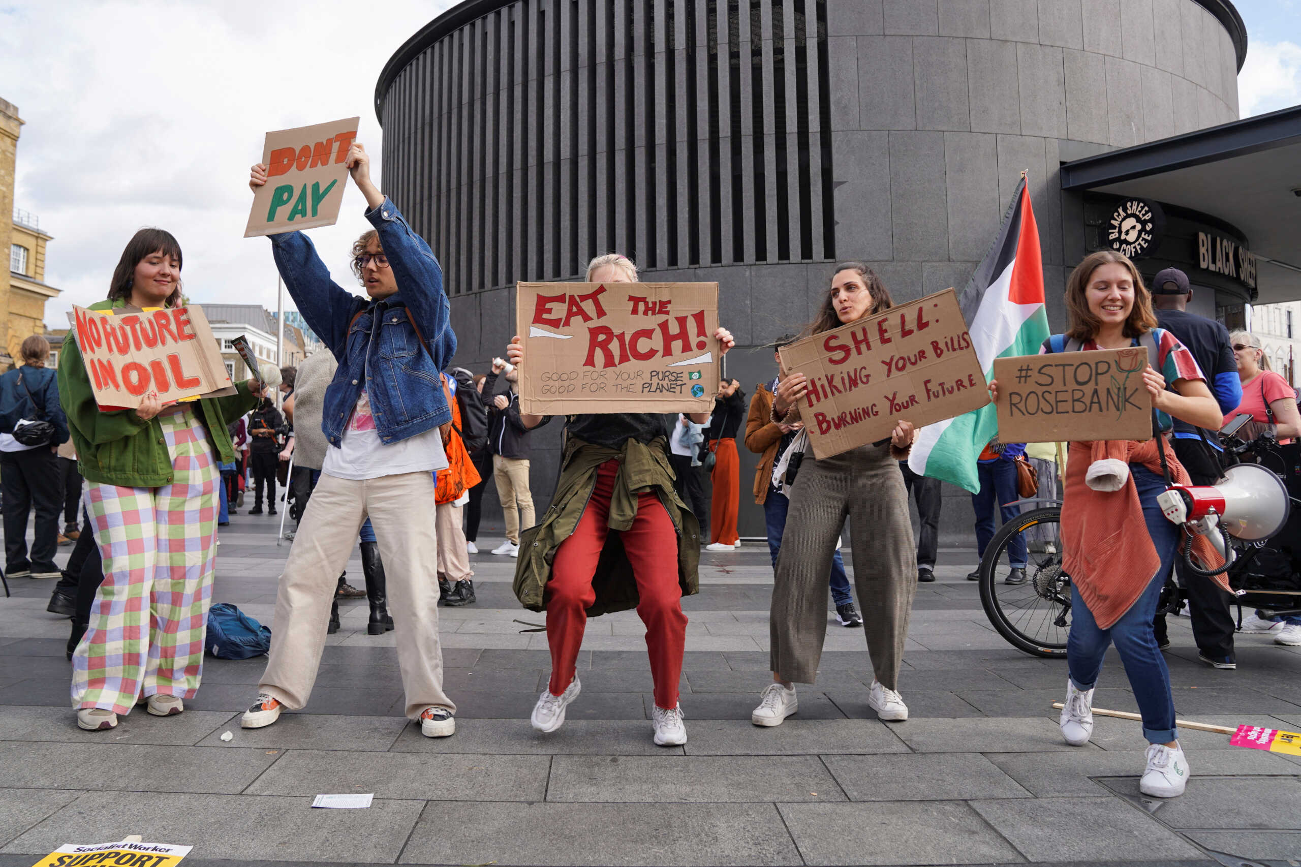 People protest during 'National Day of Action' against the current energy pricing crisis at Kings Cross in London, Britain October 1, 2022. REUTERS