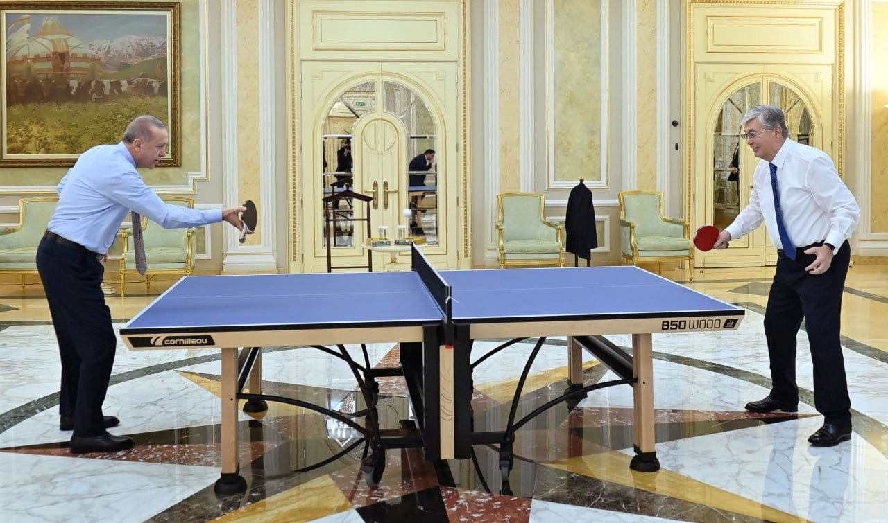 Kazakhstan's President Kassym-Jomart Tokayev and his Turkish counterpart Tayyip Erdogan play table tennis in Astana, Kazakhstan October 12, 2022.  Press service of the President of Kazakhstan