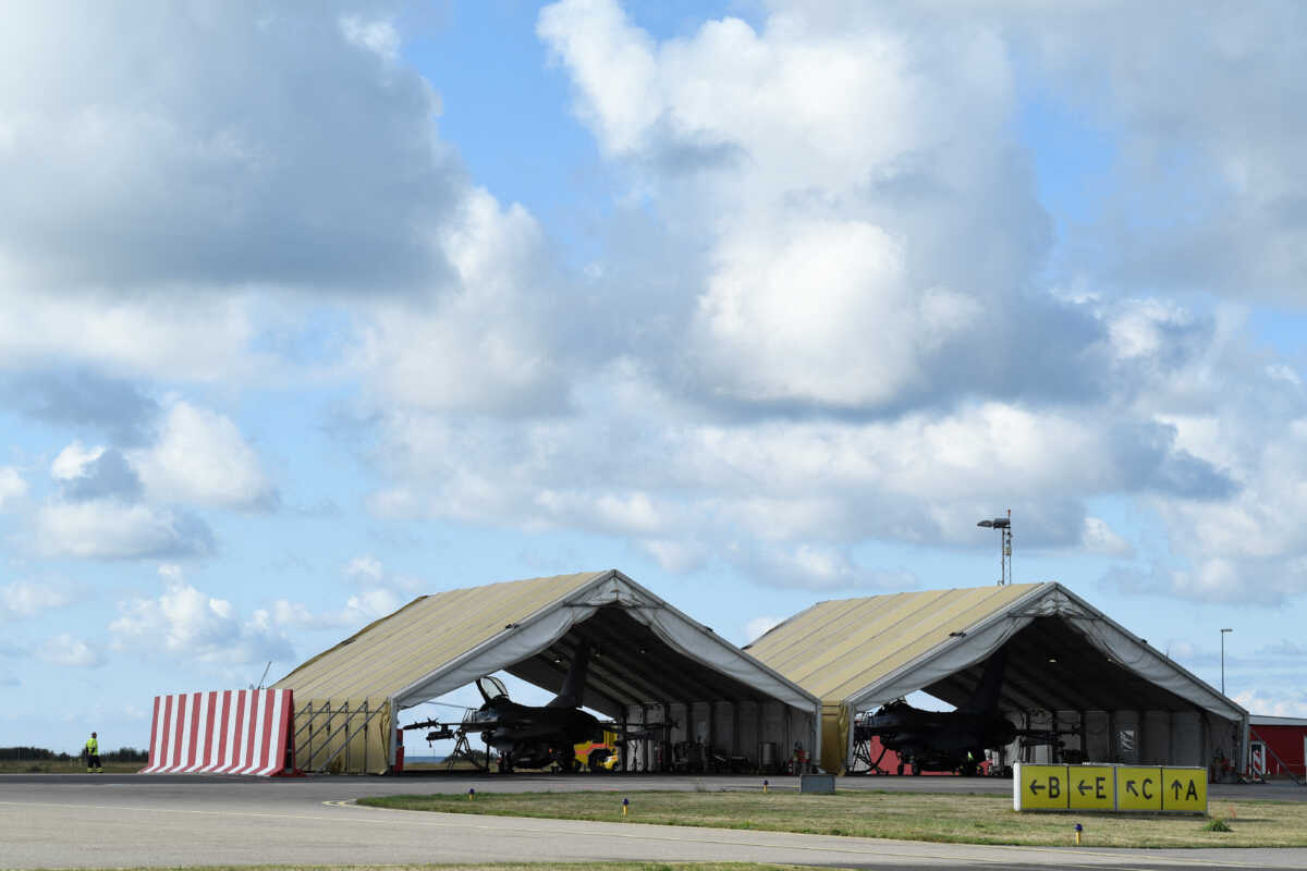 Danish Air Force F-16 jets are pictured as Danish Defence Minister Morten Bodskov, not pictured, visits the airport in Ronne on the island of Bornholm, Denmark, on September 29, 2022. REUTERS
