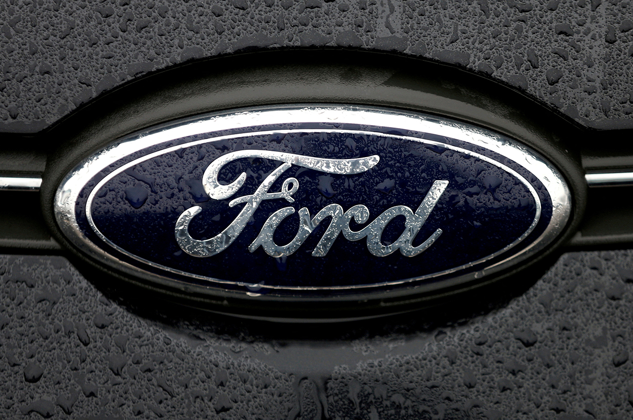FILE PHOTO: FILE PHOTO: The Ford logo is pictured at the Ford Motor Co plant in Genk,Belgium December 17, 2014. REUTERS