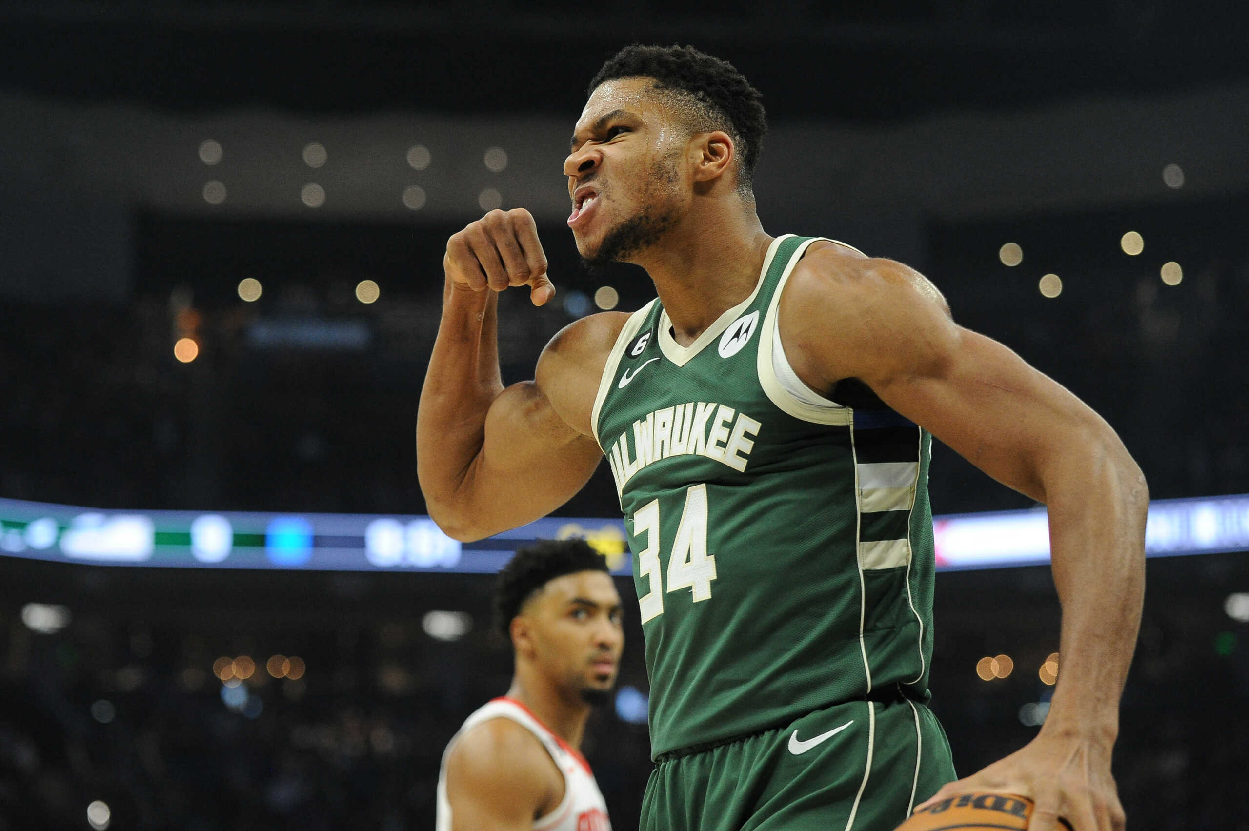 Oct 22, 2022; Milwaukee, Wisconsin, USA; Milwaukee Bucks forward Giannis Antetokounmpo (34) mean mugs to the audience after powering his way to the basket and being fouled by a Houston Rockets player in the first quarter at Fiserv Forum. Mandatory Credit: Michael McLoone-USA TODAY Sports
