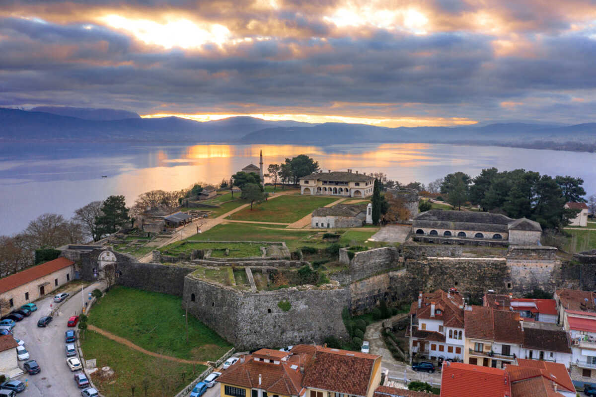 Aerial view of Ioannina city in Greece, Aslan Pasha Tzami, the lake with the island of Kyra Frosini or nissaki.