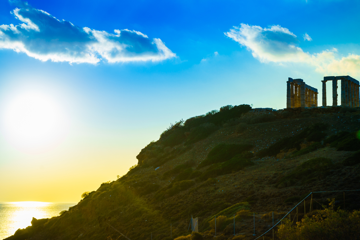 Greece Cape Sounion. Ruins of an ancient temple of Poseidon, Greek god of the sea, at sunset. Travel destinations.