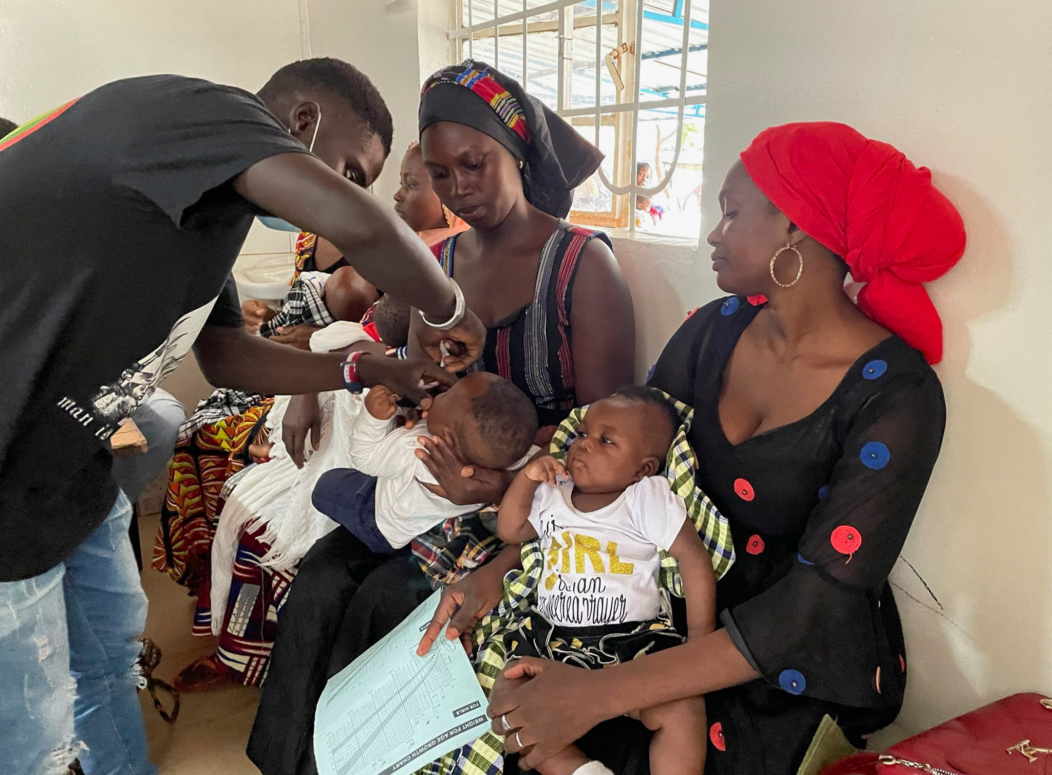 A health worker administers a polio vaccine at Bundung Maternal and Child Health Hospital in Bundung, Gambia August 30, 2022. REUTERS