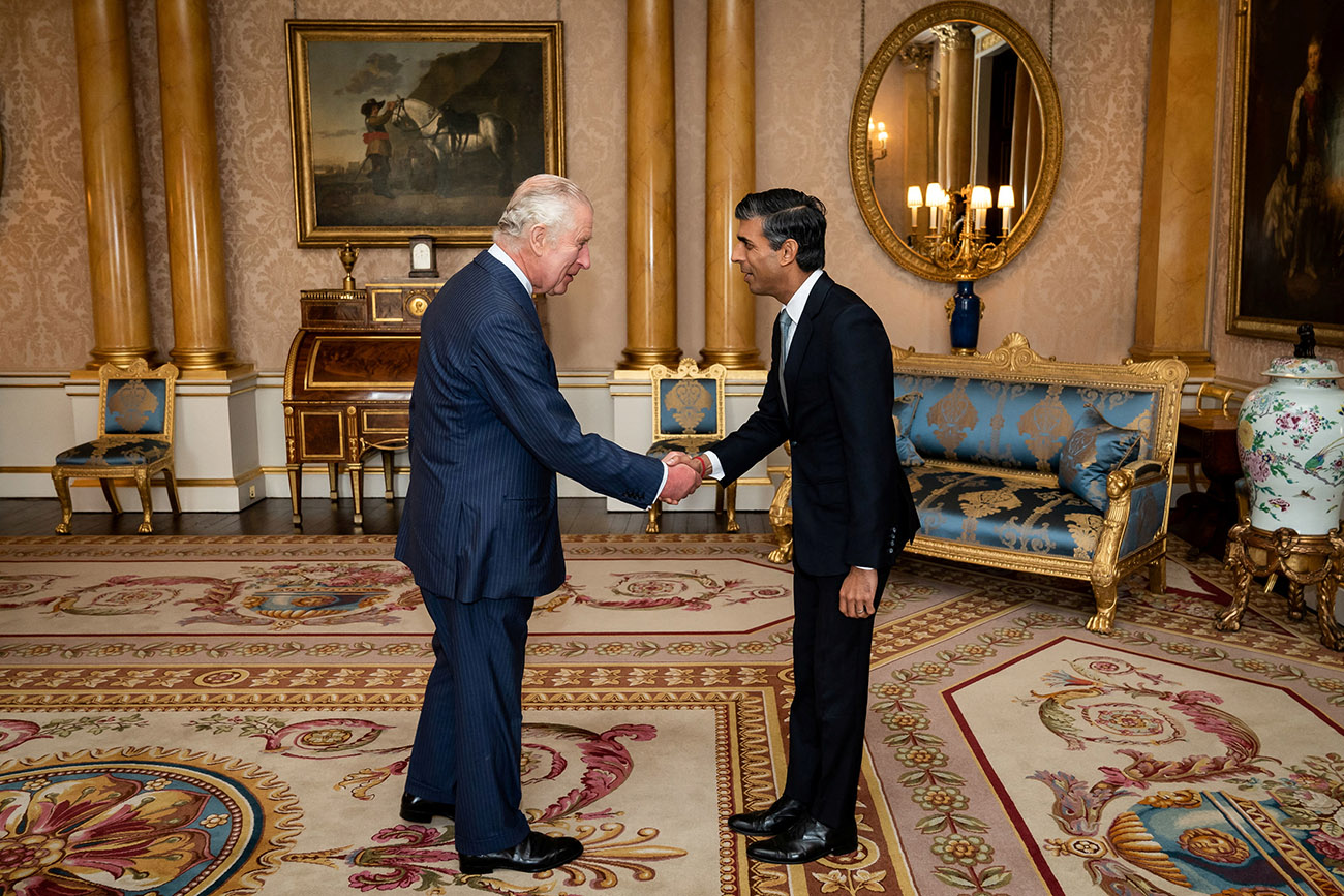 King Charles III welcomes Rishi Sunak during an audience at Buckingham Palace, London, where he invited the newly elected leader of the Conservative Party to become Prime Minister and form a new government. Picture date: Tuesday October 25, 2022. Aaron Chown