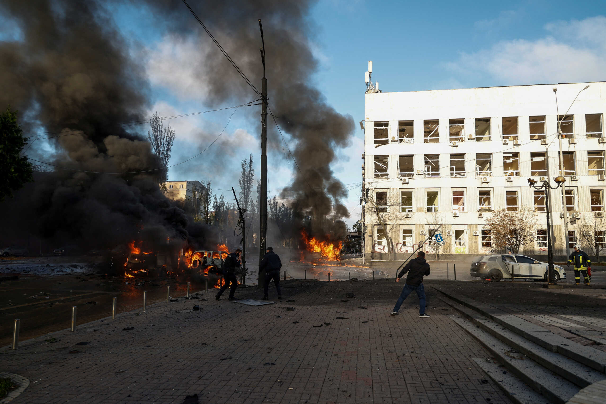 Cars are on fire after Russia's missile attack in Kyiv, Ukraine October 10, 2022. REUTERS