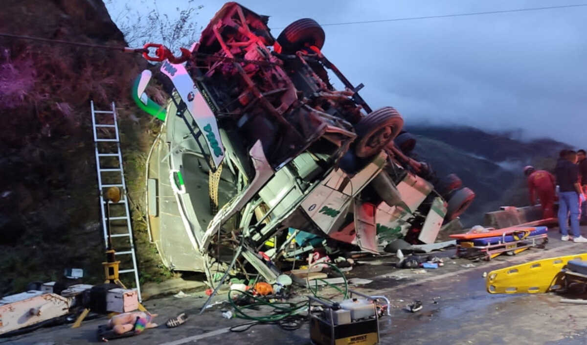 Emergency personnel work at the site of a bus crash on the Chachagui ? Popayan highway, in La Ensillada, Colombia October 15, 2022 in this  picture obtained from social media. Bomberos Pasto