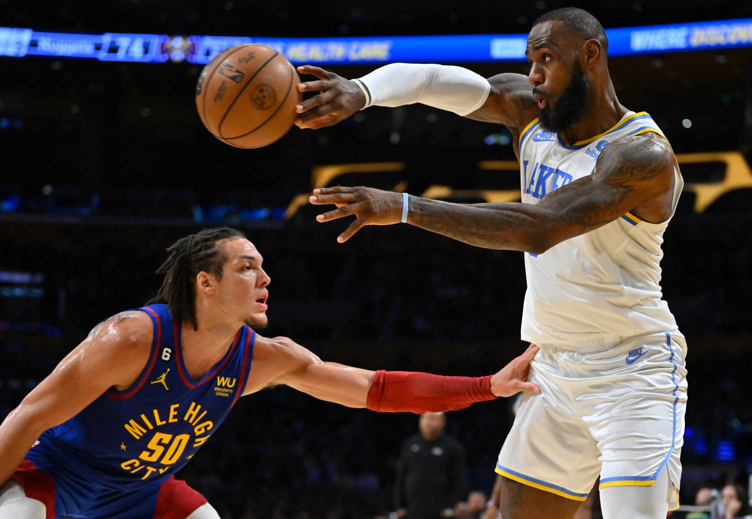Oct 30, 2022; Los Angeles, California, USA; Denver Nuggets forward Aaron Gordon (50) guards Los Angeles Lakers forward LeBron James (6) in the second half at Crypto.com Arena. Mandatory Credit: Jayne Kamin-Oncea-USA TODAY Sports