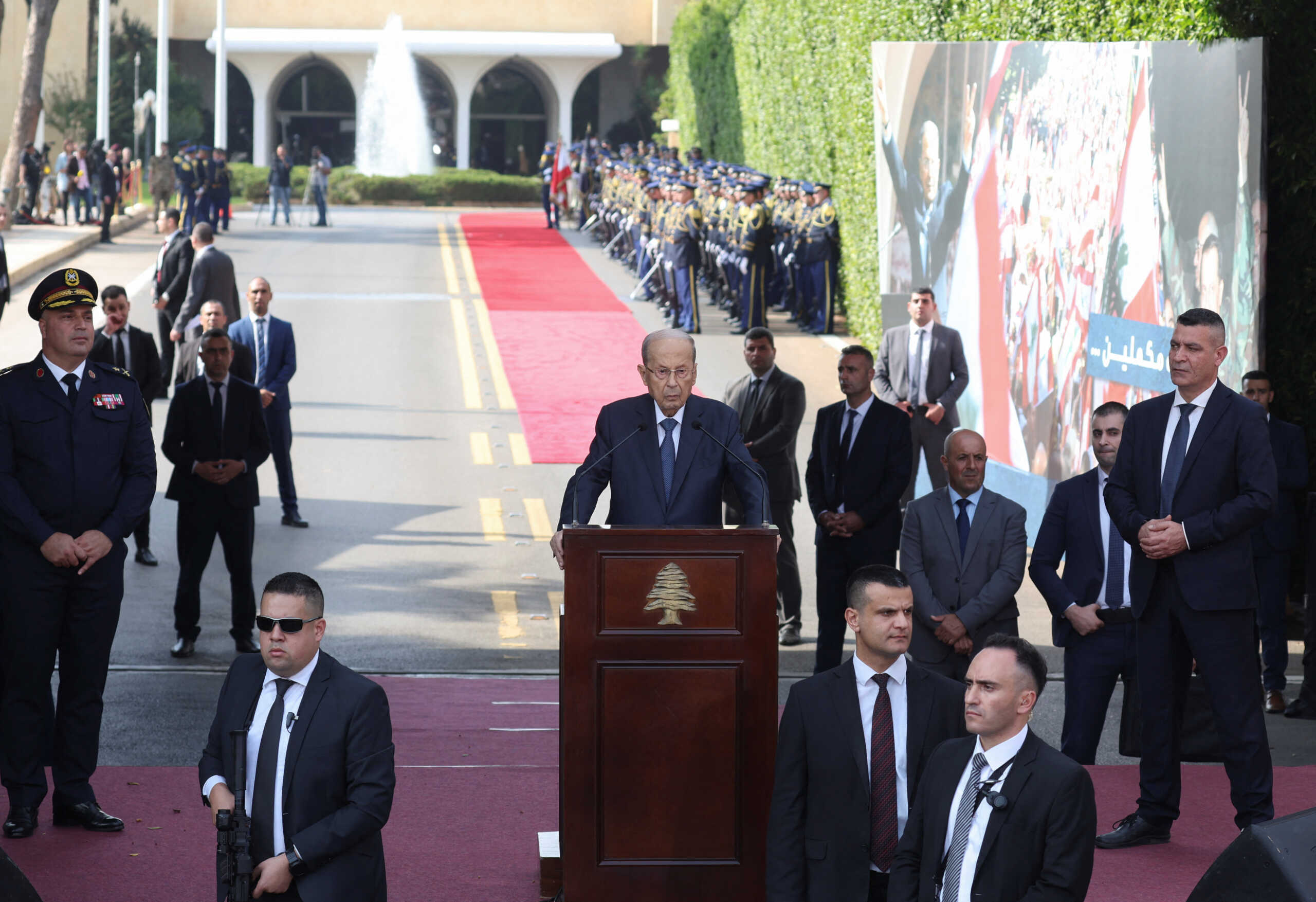 Lebanese outgoing President Michel Aoun addresses his supporters as he leaves the presidential palace a day before his six-year term officially ends, in Baabda, Lebanon October 30, 2022. REUTERS