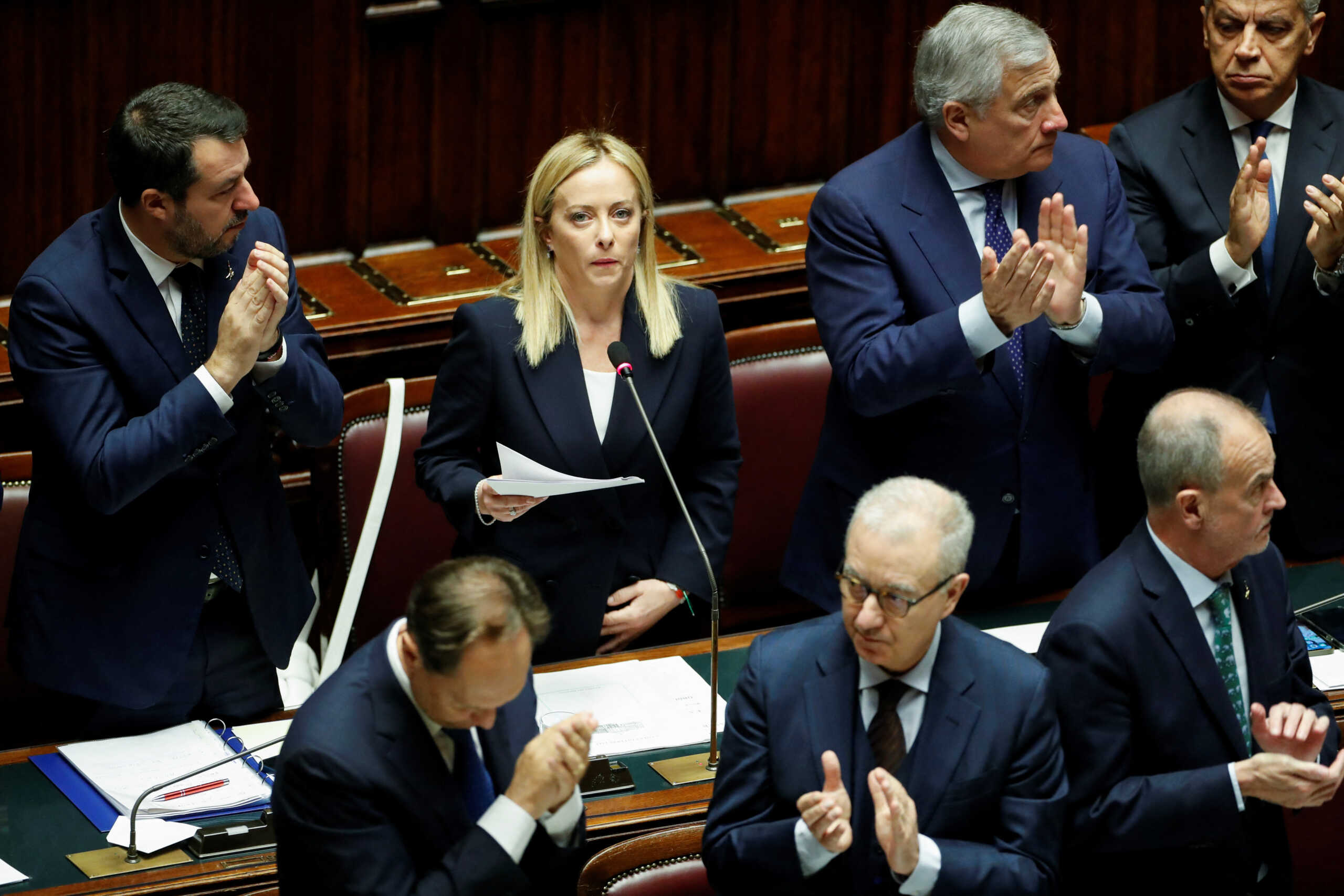 Italy's Prime Minister Giorgia Meloni, Deputy Prime Minister and Infrastructure Minister Matteo Salvini and Foreign Minister Antonio Tajani attend the lower house of parliament ahead of a confidence vote for the new government, in Rome, Italy, October 25, 2022. REUTERS