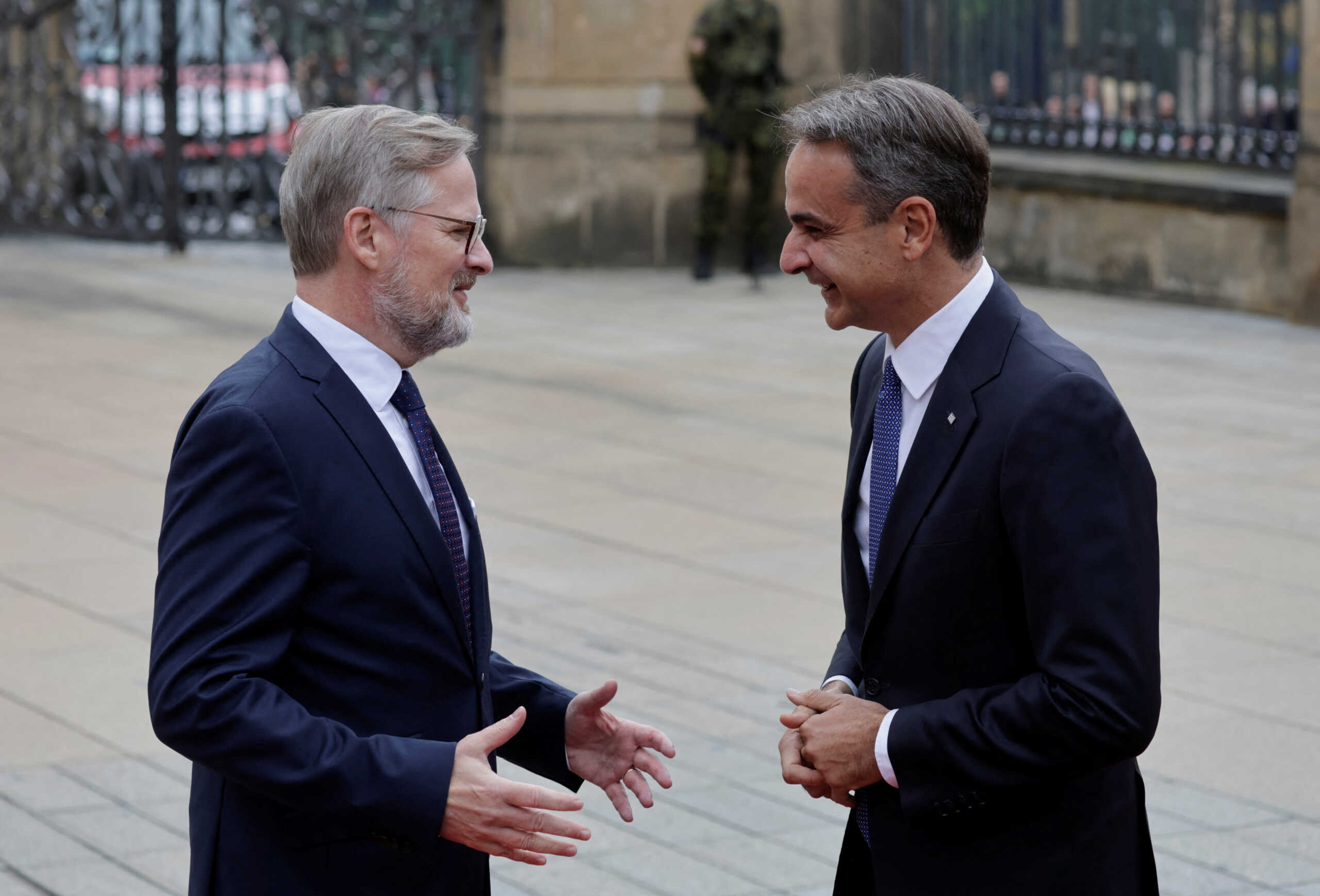 Czech Prime Minister Petr Fiala welcomes Greek Prime Minister Kyriakos Mitsotakis at the Informal EU 27 Summit and Meeting within the European Political Community at Prague Castle in Prague, Czech Republic, October 6, 2022. REUTERS