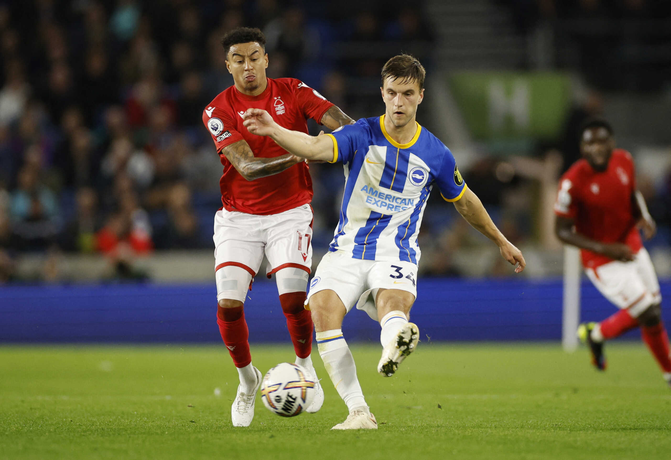 Soccer Football - Premier League - Brighton & Hove Albion v Nottingham Forest - The American Express Community Stadium, Brighton, Britain - October 18, 2022 Brighton & Hove Albion's Joel Veltman in action with Nottingham Forest's Jesse Lingard Action Images via Reuters