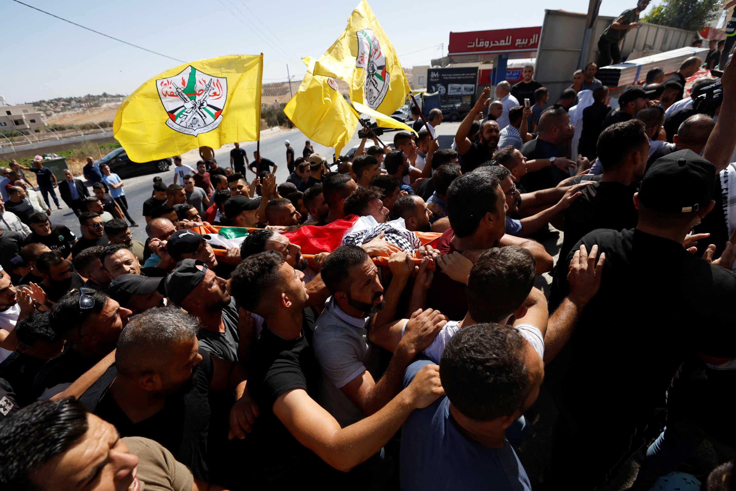 People mourn during the funeral of seven-year-old Palestinian boy Rayyan Suleiman, who according to his father has died of heart failure while being chased by Israeli soldiers, in east of Bethlehem, Israeli-occupied West Bank September 30, 2022. REUTERS