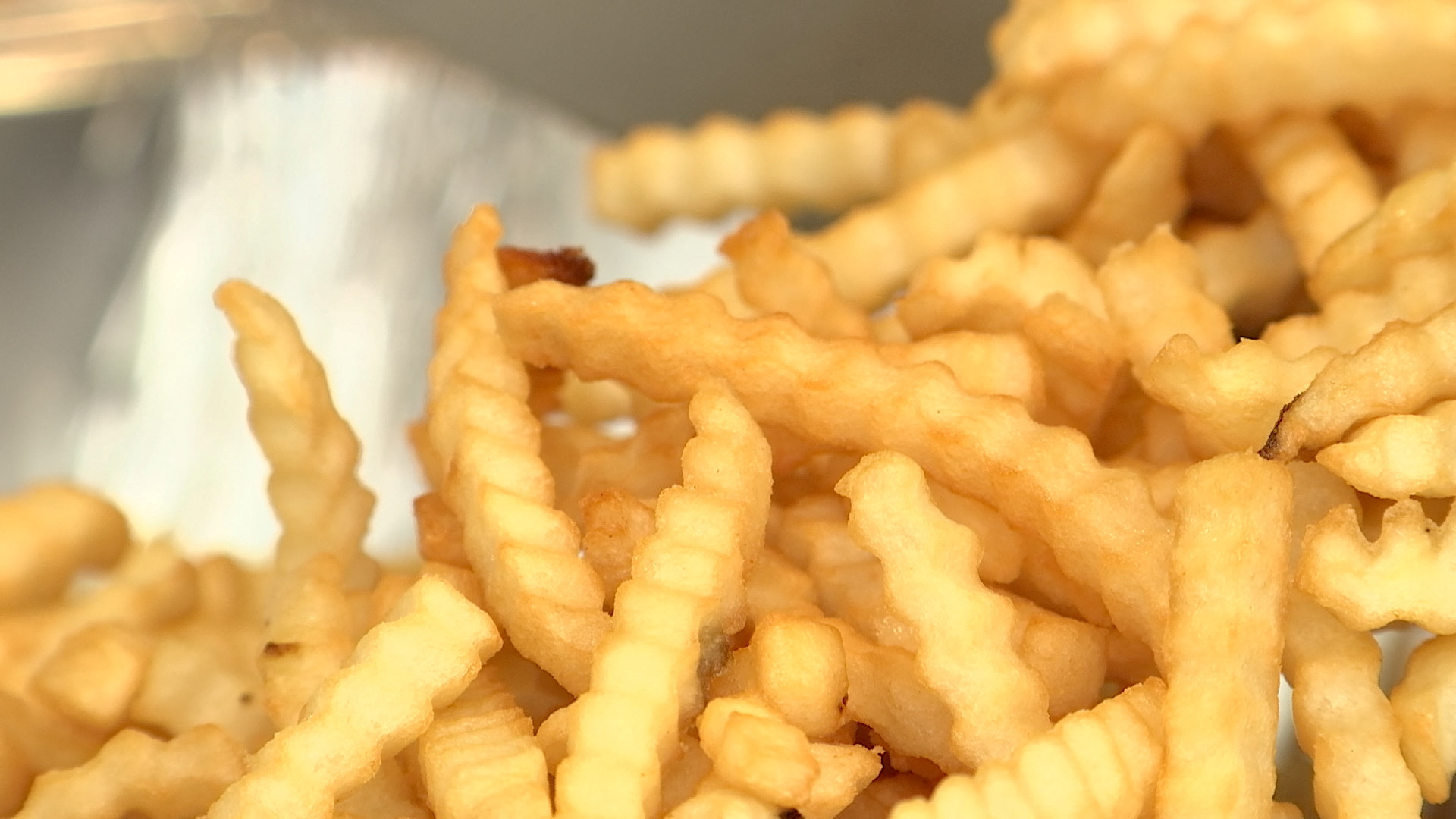 Fries prepared by the Flippy 2 robot are seen at a lab of manufacturer Miso Robotics Inc in Pasadena, California, U.S. September 27, 2022 in this screen grab from a REUTERS video. Sandra Stojanovic