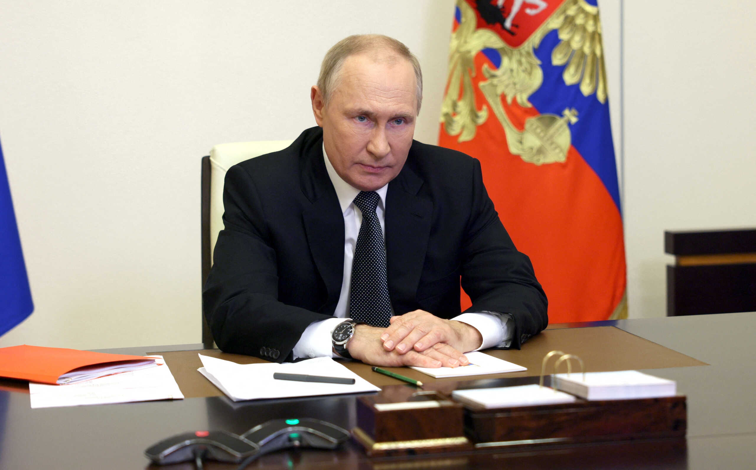 Russian President Vladimir Putin chairs a meeting with members of the Security Council via a video link at a residence outside Moscow, Russia, October 19, 2022. Sputnik