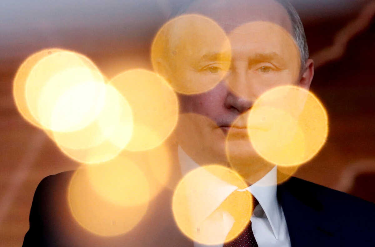 FILE PHOTO: Russian President Vladimir Putin reacts during his annual end-of-year news conference in Moscow, Russia December 19, 2019. REUTERS