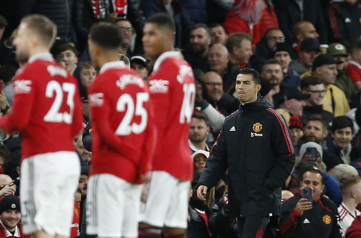 Soccer Football - Premier League - Manchester United v Tottenham Hotspur - Old Trafford, Manchester, Britain - October 19, 2022 Manchester United's Cristiano Ronaldo walks to the substitutes bench ahead of the match REUTERS