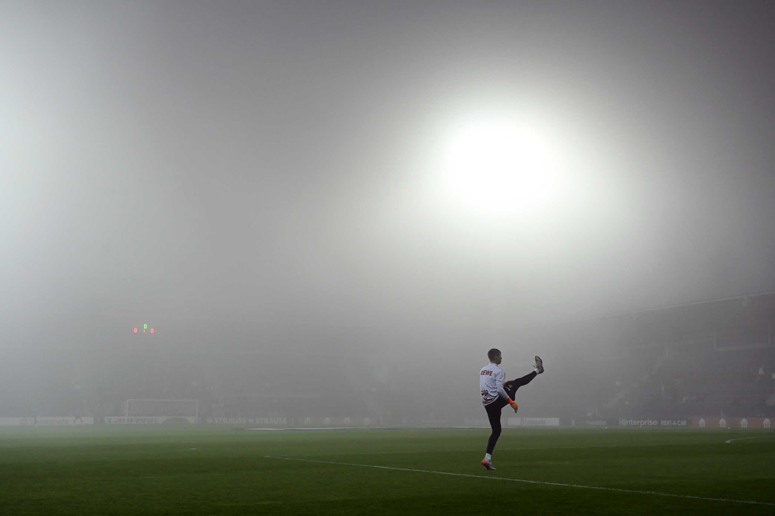 Soccer Football - Europa Conference League - Group D - 1. FC Slovacko v FC Cologne - Mestsky fotbalovy stadion Miroslava Valenty, Uherske Hradiste, Czech Republic - October 27, 2022 General view of players warming up in the fog before the match REUTERS