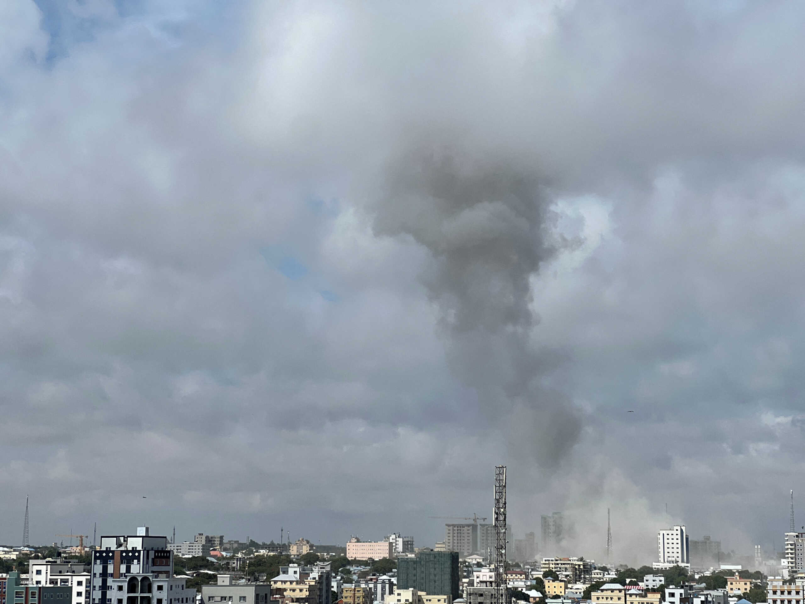 A view shows smoke rising following a car bomb explosion at Somalia's education ministry in Mogadishu, Somalia October 29, 2022 in this picture obtained from social media. Abdihalim Bashir