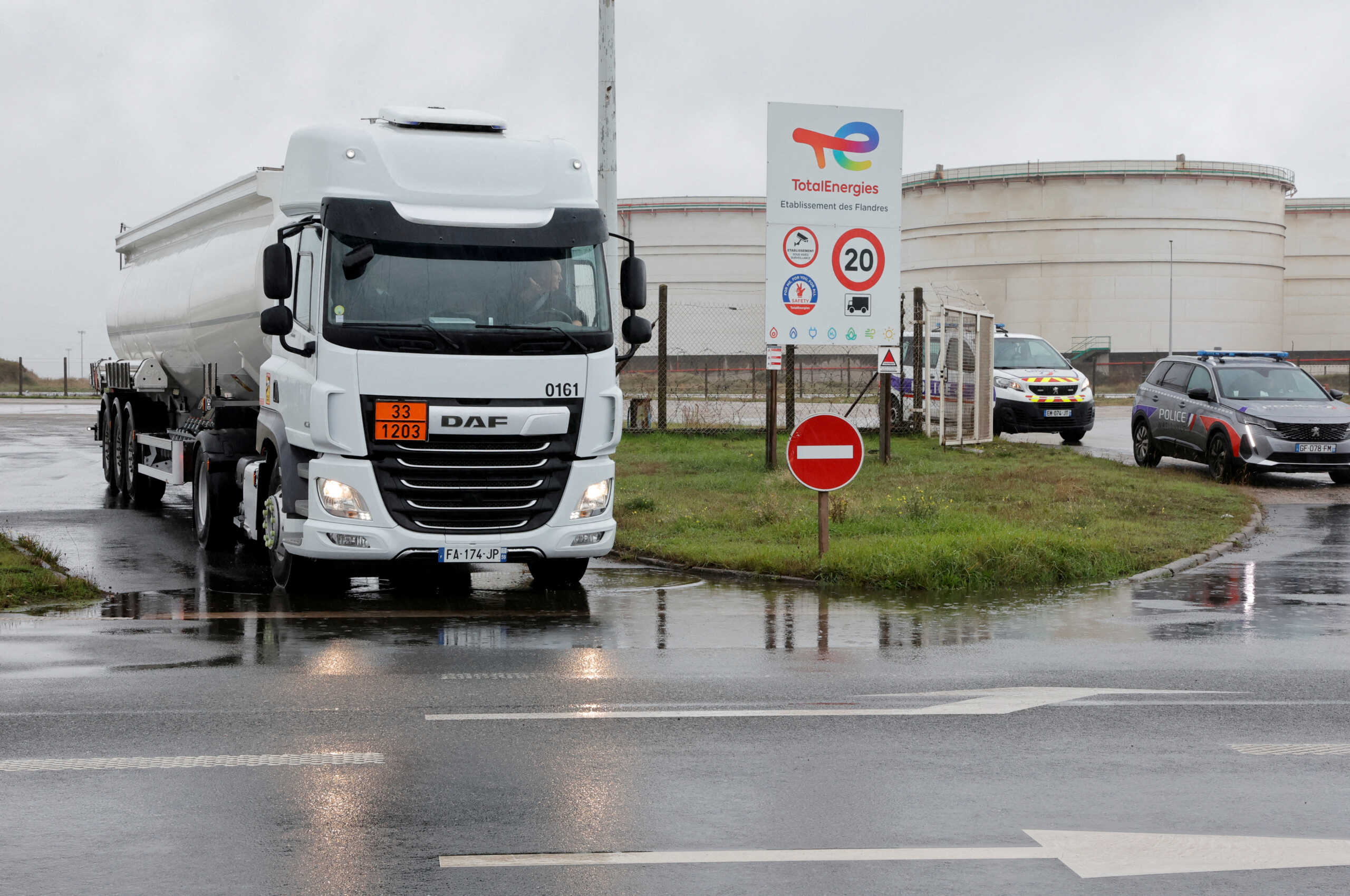 FILE PHOTO: A fuel tanker leaves a TotalEnergies depot and former oil refinery, in Mardyck near Dunkerque, France, October 13, 2022. REUTERS
