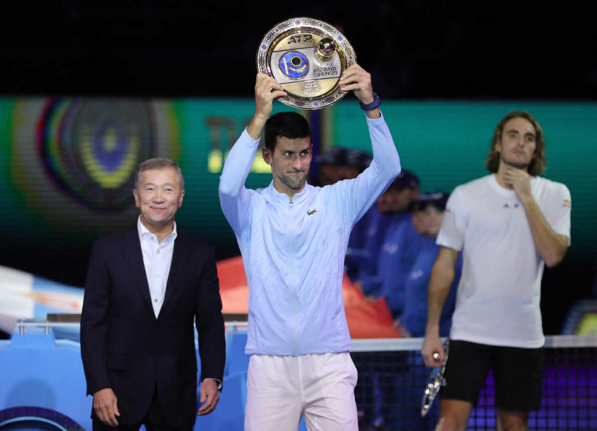 Tennis - ATP 500 - Astana Open - National Tennis Center, Astana, Kazakhstan - October 9, 2022 Serbia's Novak Djokovic celebrates with a trophy after winning the men's singles final against Greece's Stefanos Tsitsipas REUTERS