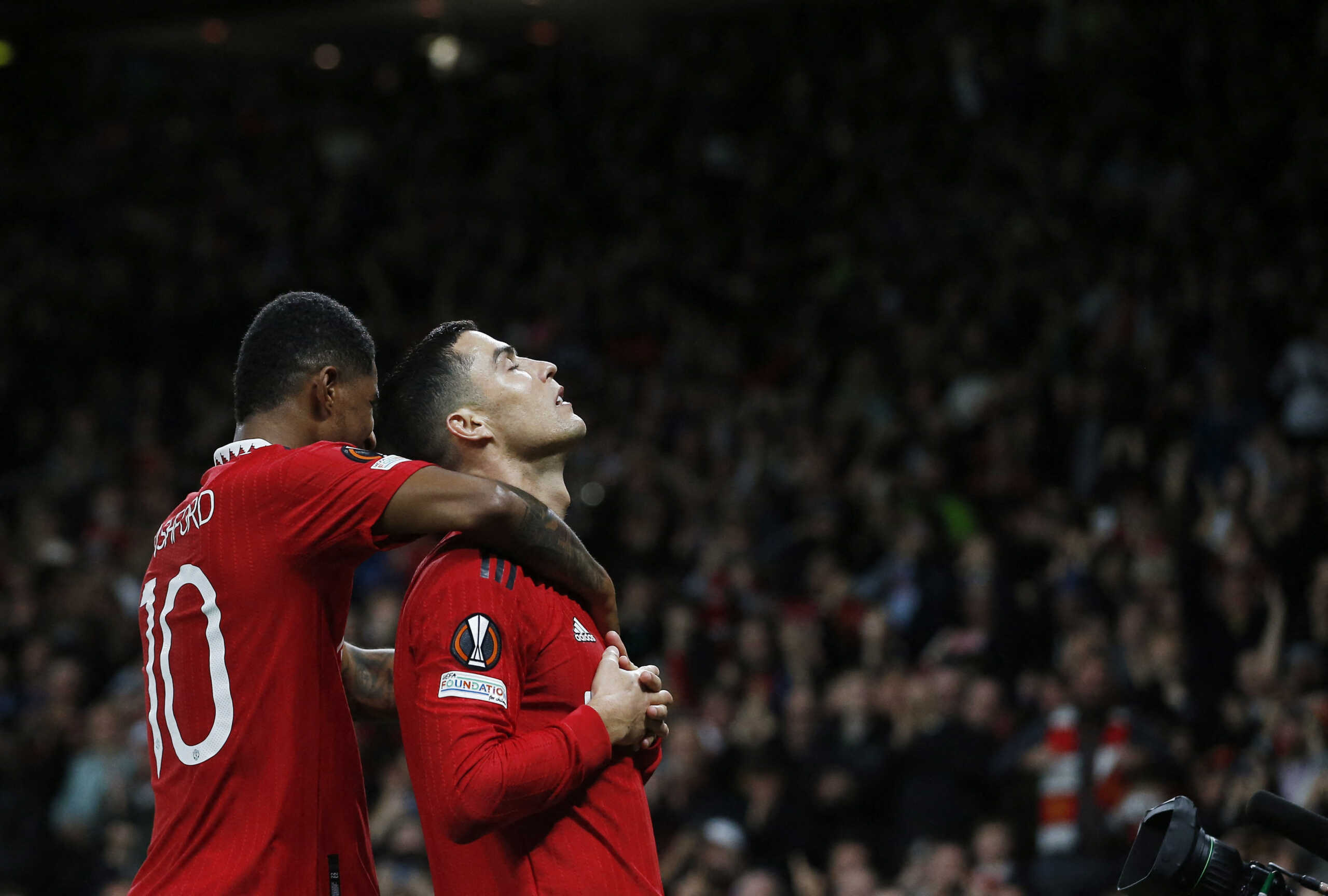 Soccer Football - Europa League - Group E - Manchester United v Sheriff Tiraspol - Old Trafford, Manchester, Britain - October 27, 2022 Manchester United's Cristiano Ronaldo celebrates scoring their third goal with Marcus Rashford REUTERS