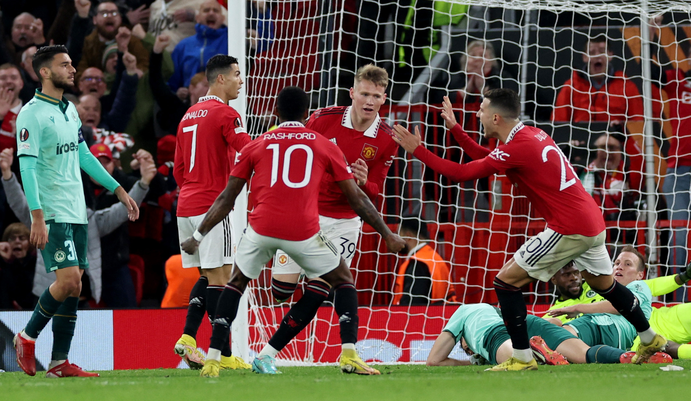 Soccer Football - Europa League - Group E - Manchester United v Omonia - Old Trafford, Manchester, Britain - October 13, 2022 Manchester United's Scott McTominay celebrates scoring their first goal with Cristiano Ronaldo, Marcus Rashford and Diogo Dalot REUTERS