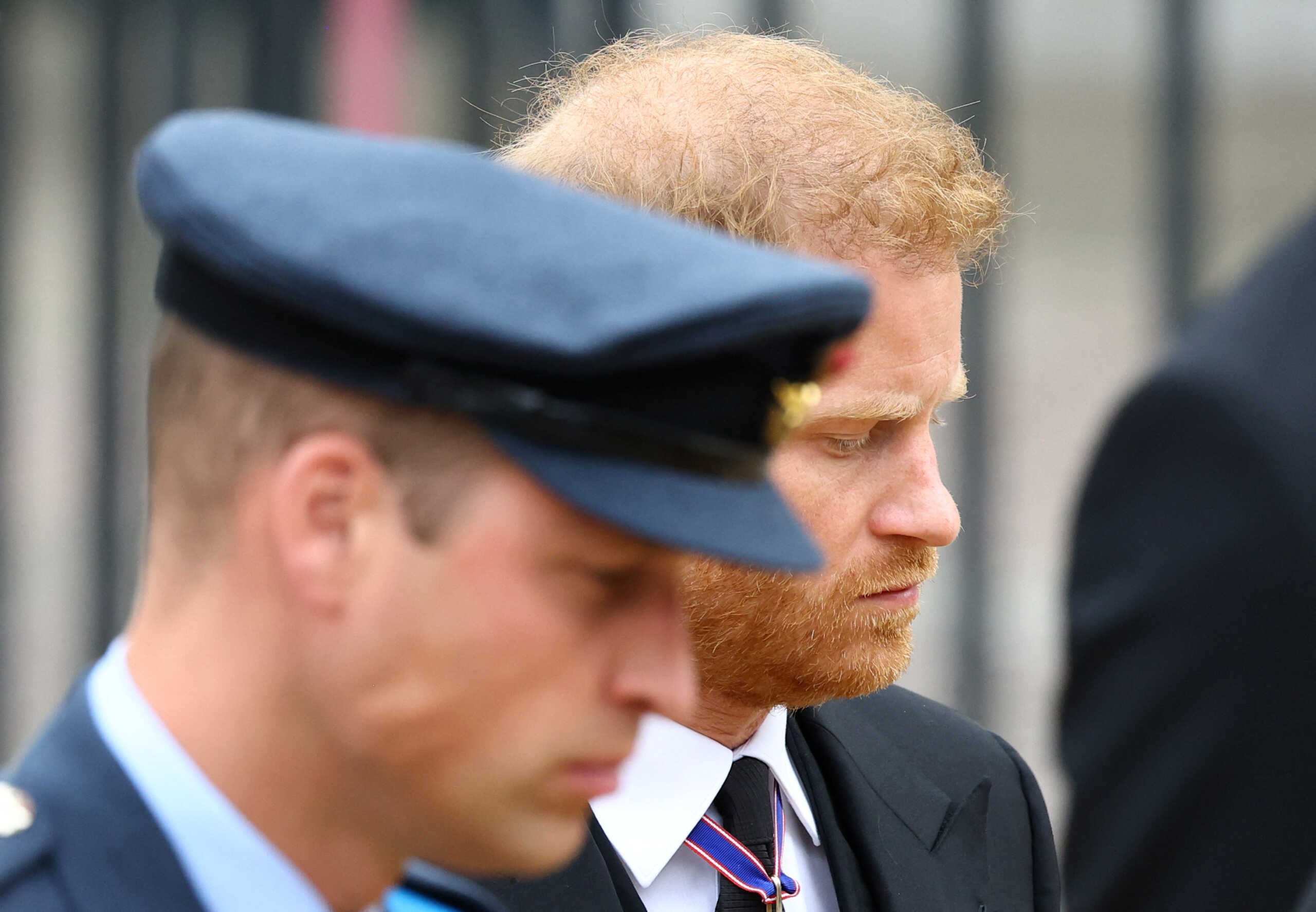 Britain's Prince Harry, Duke of Sussex, and William, Prince of Wales, attend the state funeral and burial of Britain's Queen Elizabeth, in London, Britain, September 19, 2022.  REUTERS