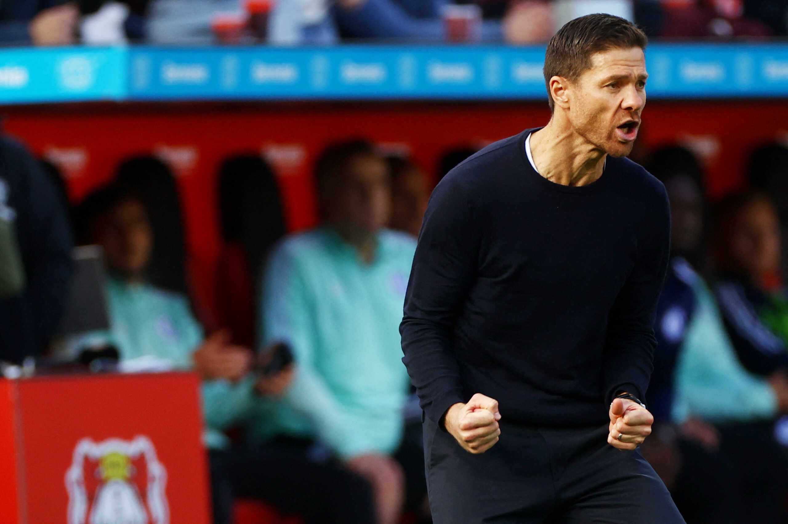 Soccer Football - Bundesliga - Bayer Leverkusen v Schalke 04 - BayArena, Leverkusen, Germany - October 8, 2022 Bayer Leverkusen coach Xabi Alonso celebrates their first goal scored by Moussa Diaby REUTERS