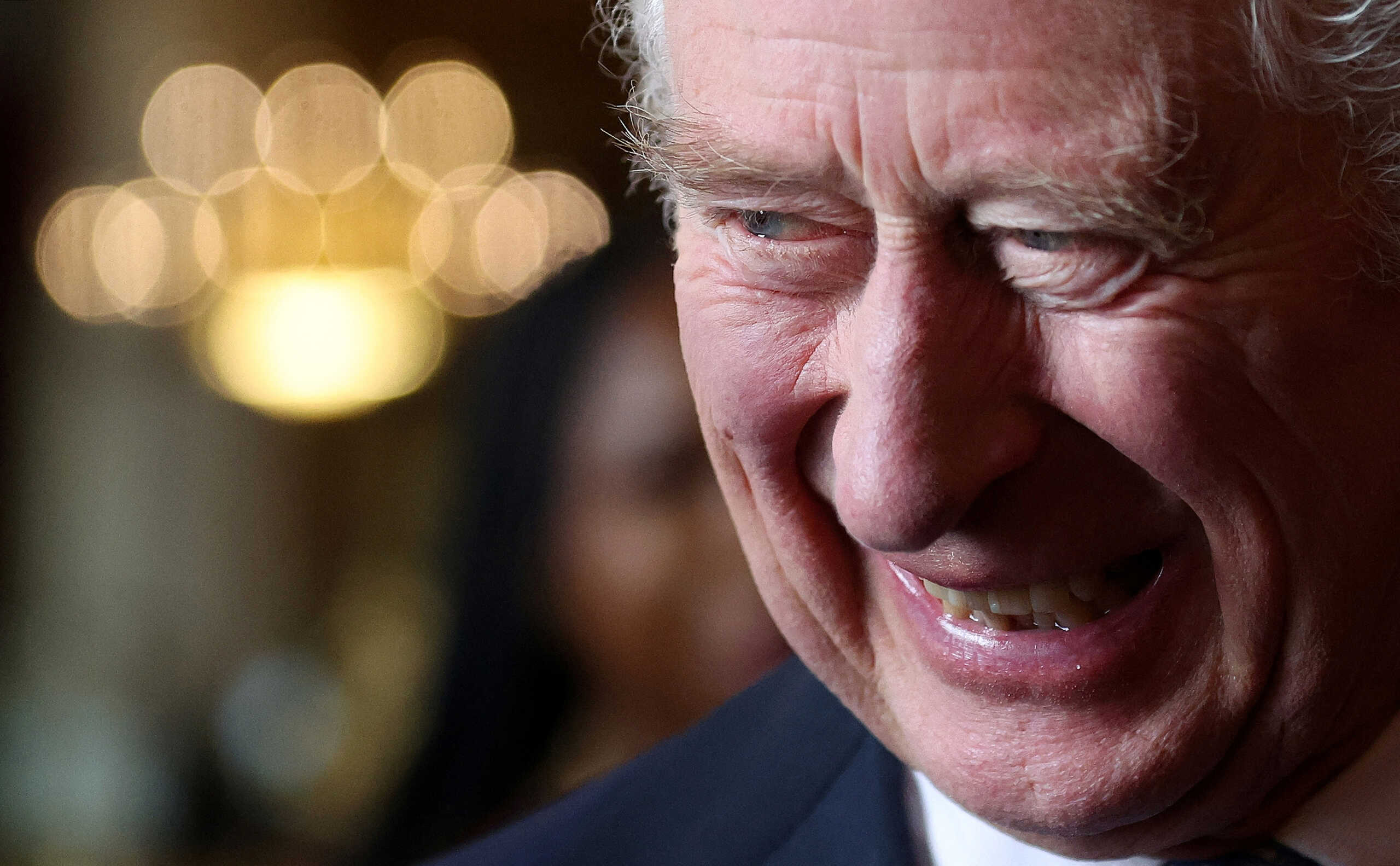 Britain's King Charles talks with guests whilst hosting a reception commemorating the 50th anniversary of the Resettlement of British Asians from Uganda, in the State Dining Room at Buckingham Palace in London, Britain November 2, 2022. Isabel Infantes