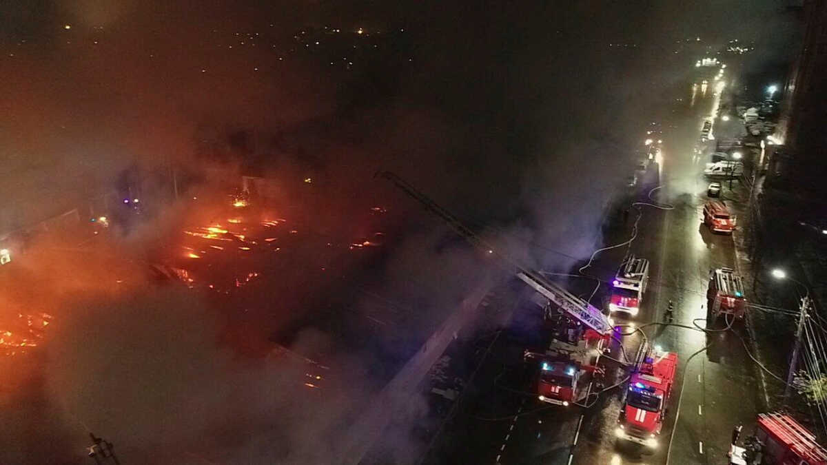 Firefighters work to extinguish a fire at a cafe in Kostroma, Russia November 5, 2022. Russian Emergencies Ministry in Kostroma region