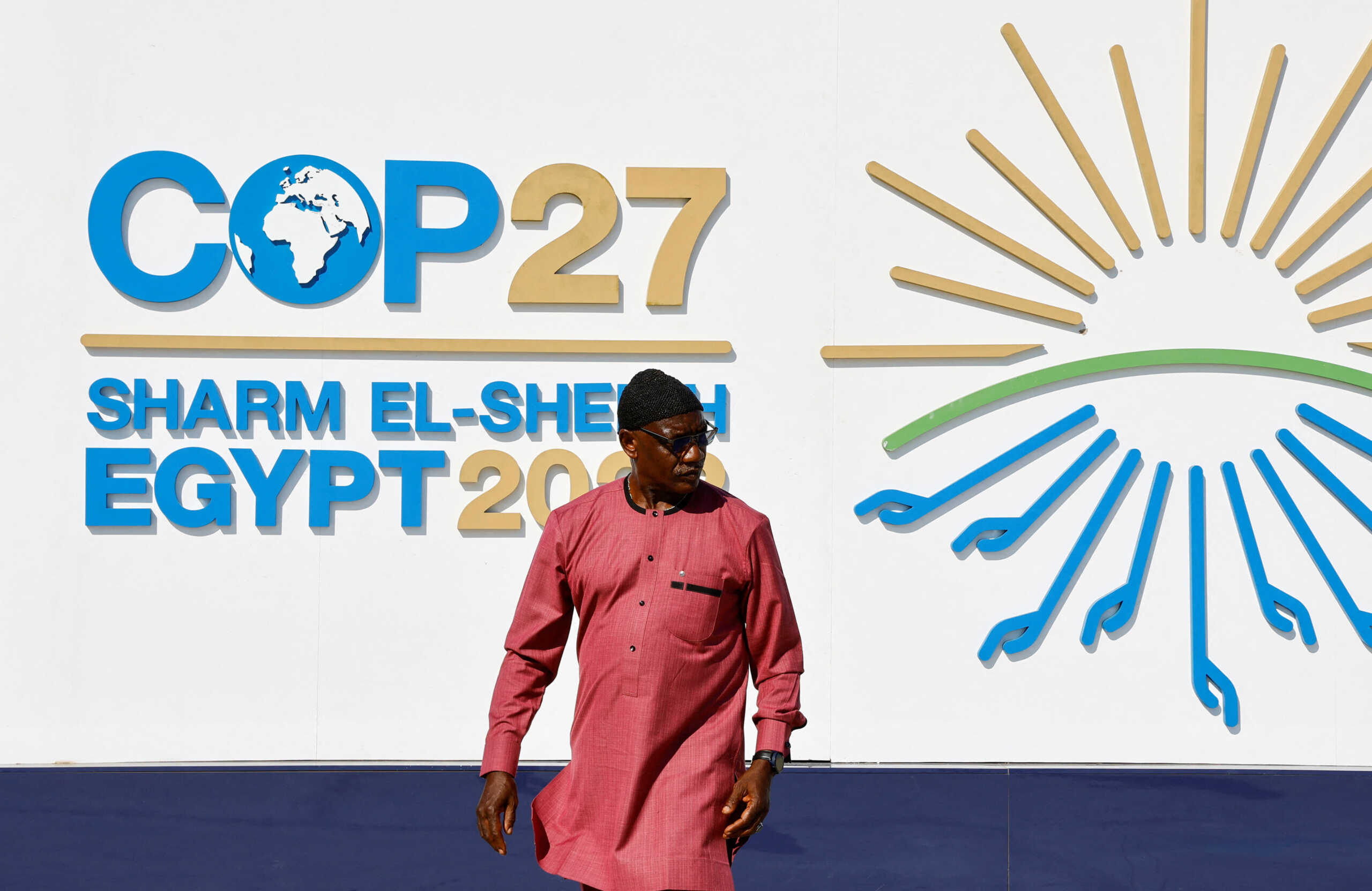 A man walks outside of the Sharm El Sheikh International Convention Centre during the COP27 climate summit opening in Egypt's Red Sea resort of Sharm el-Sheikh, Egypt November 6, 2022. REUTERS