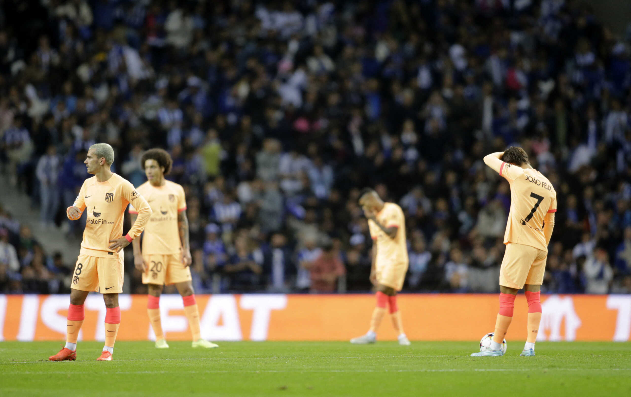 Soccer Football - Champions League - Group B - FC Porto v Atletico Madrid - Estadio do Dragao, Porto, Portugal - November 1, 2022 Atletico Madrid's Antoine Griezmann, Axel Witsel and Joao Felix react after FC Porto's Mehdi Taremi scored their first goal REUTERS