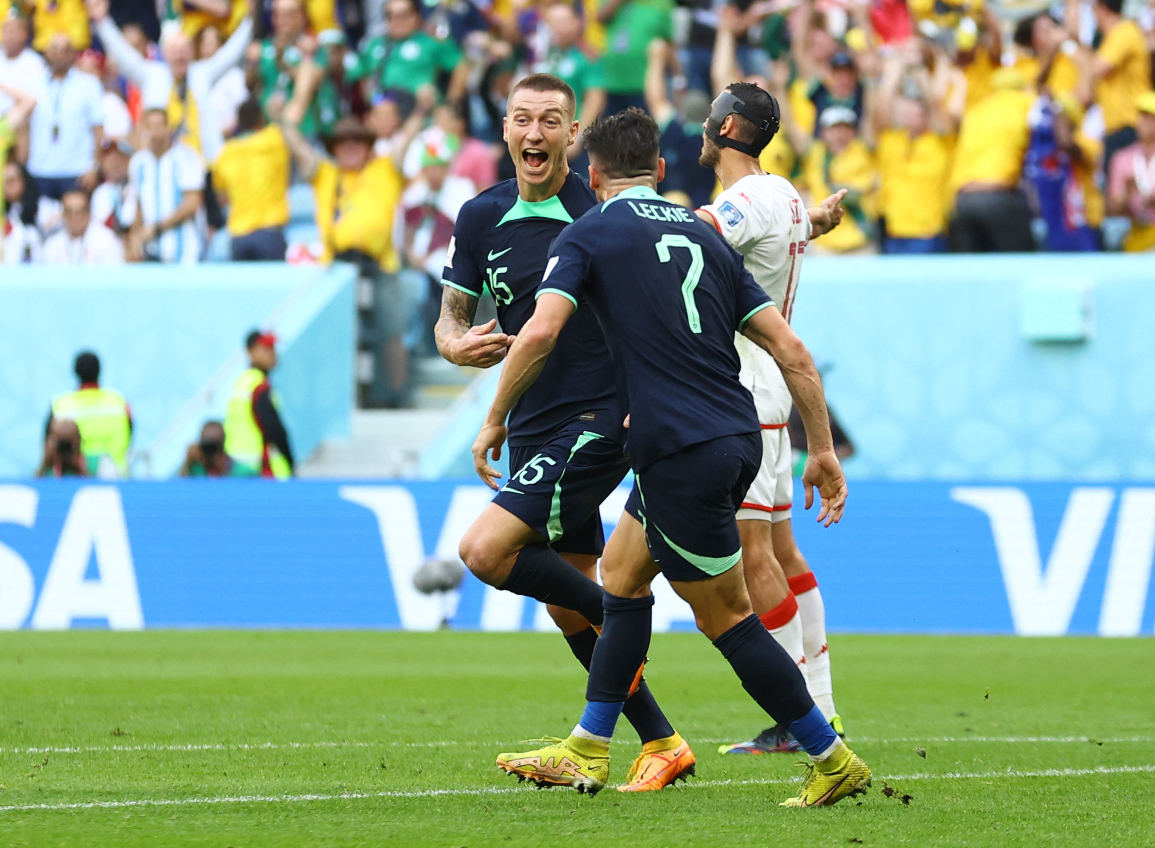 Soccer Football - FIFA World Cup Qatar 2022 - Group D - Tunisia v Australia - Al Janoub Stadium, Al Wakrah, Qatar - November 26, 2022 Australia's Mitchell Duke celebrates scoring their first goal with Mathew Leckie REUTERS