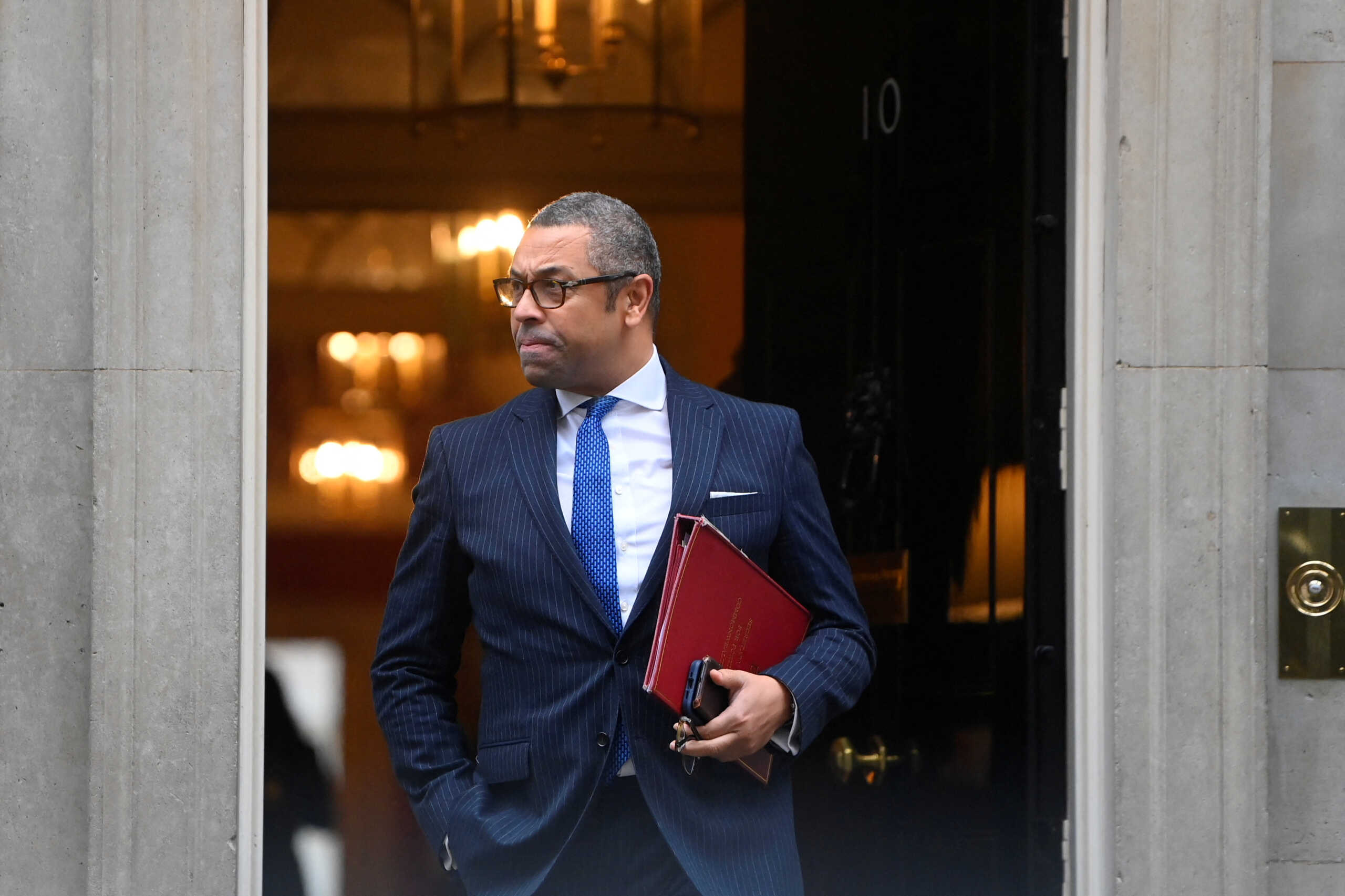 British Foreign Secretary James Cleverly walks outside Number 10 Downing Street, in London, Britain, November 17, 2022. REUTERS