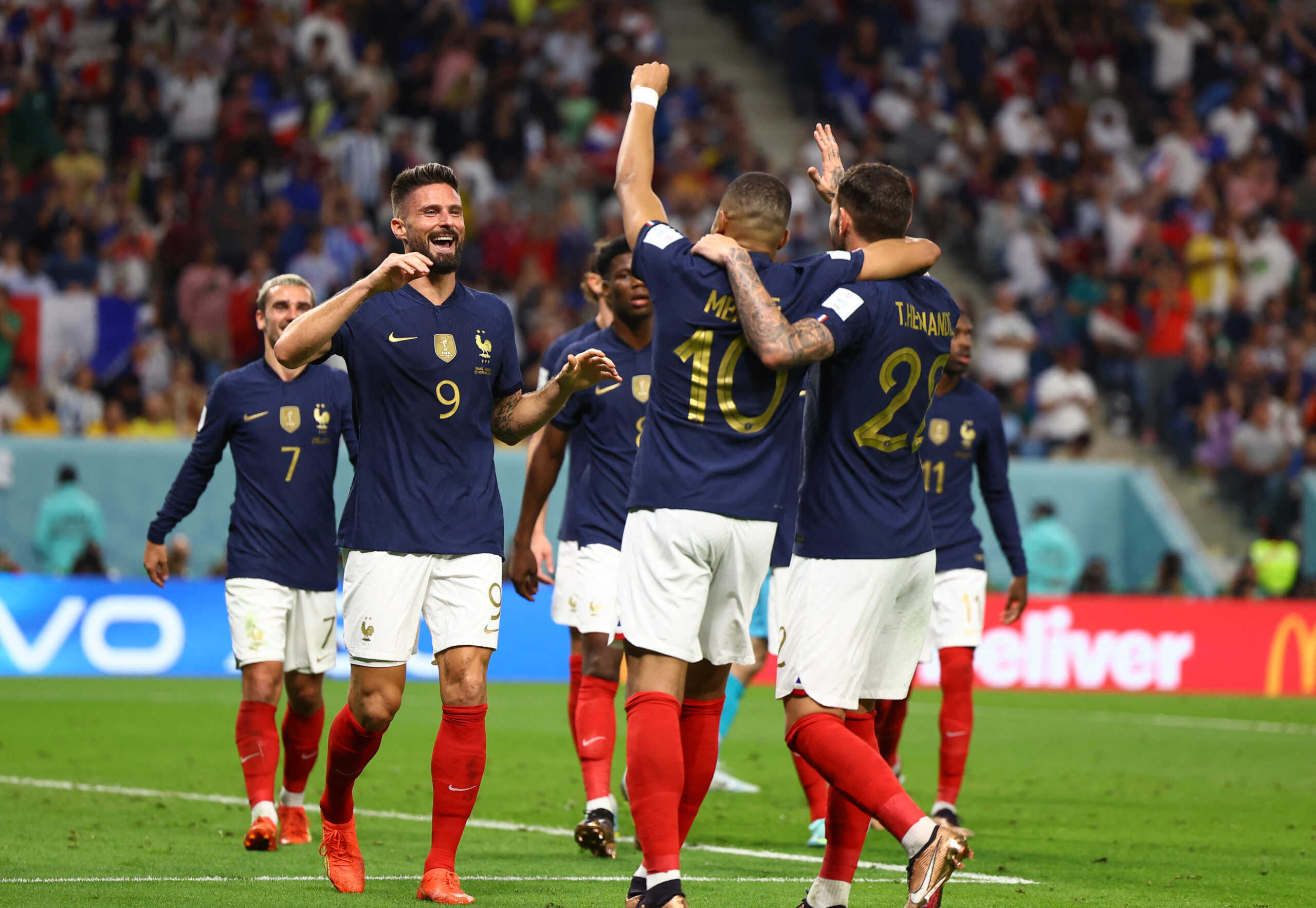 Soccer Football - FIFA World Cup Qatar 2022 - Group D - France v Australia - Al Janoub Stadium, Al Wakrah, Qatar - November 22, 2022  France's Olivier Giroud celebrates scoring their fourth goal with Kylian Mbappe and Theo Hernandez REUTERS