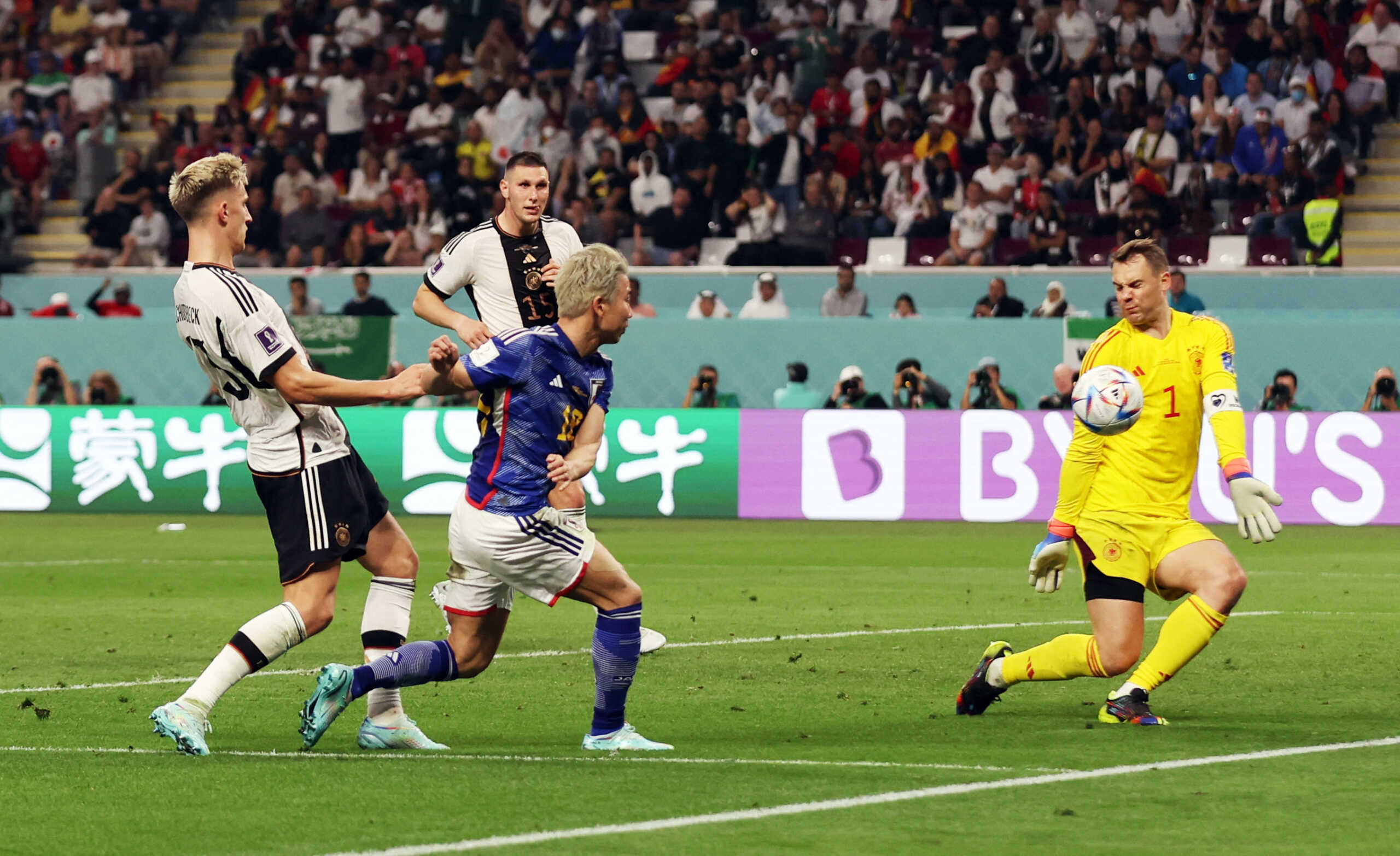 Soccer Football - FIFA World Cup Qatar 2022 - Group E - Germany v Japan - Khalifa International Stadium, Doha, Qatar - November 23, 2022 Japan's Takuma Asano scores their second goal REUTERS