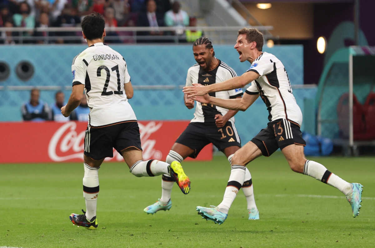 Soccer Football - FIFA World Cup Qatar 2022 - Group E - Germany v Japan - Khalifa International Stadium, Doha, Qatar - November 23, 2022 Germany's Ilkay Gundogan celebrates scoring their first goal with teammates REUTERS