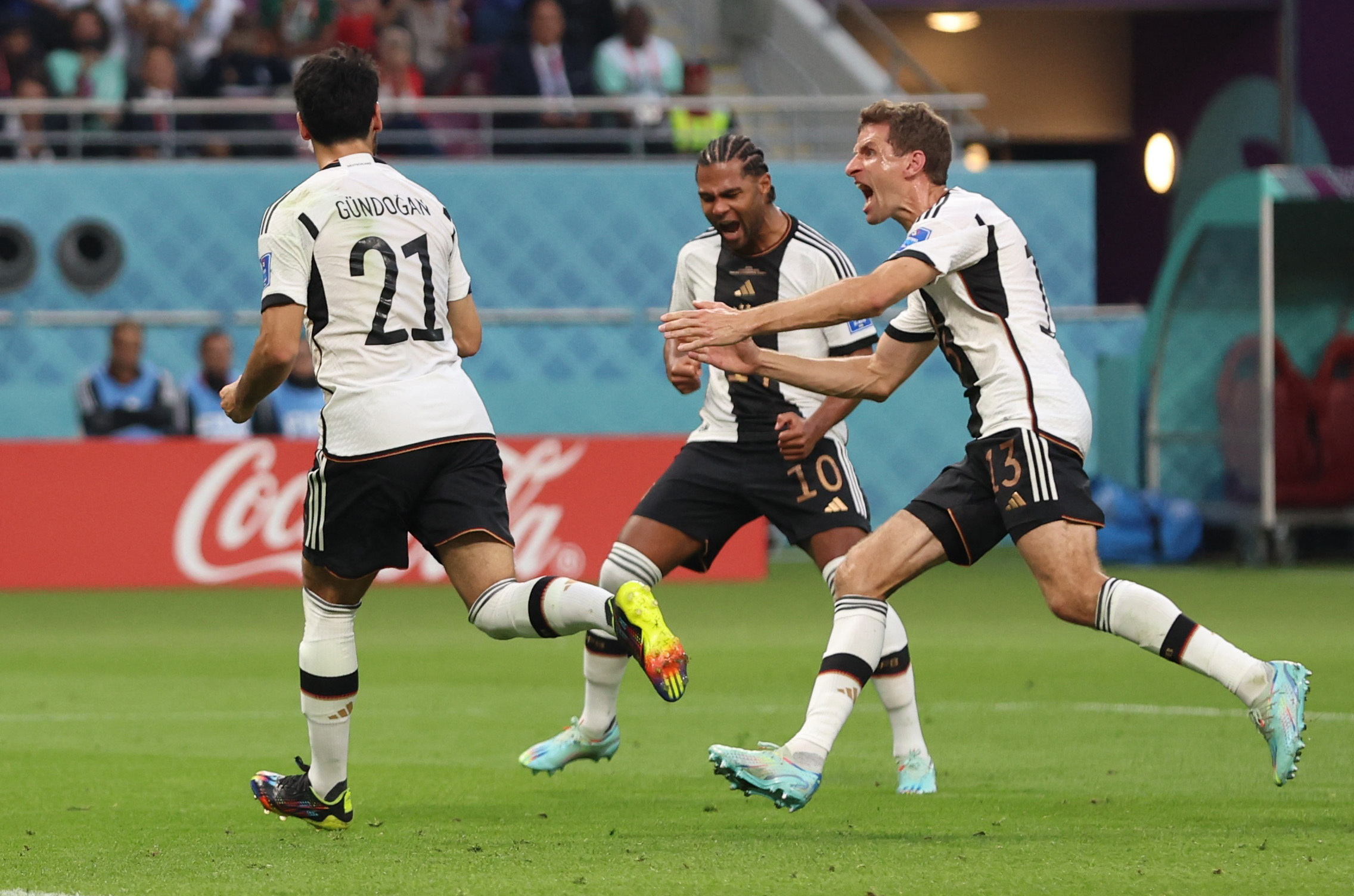 Soccer Football - FIFA World Cup Qatar 2022 - Group E - Germany v Japan - Khalifa International Stadium, Doha, Qatar - November 23, 2022 Germany's Ilkay Gundogan celebrates scoring their first goal with teammates REUTERS