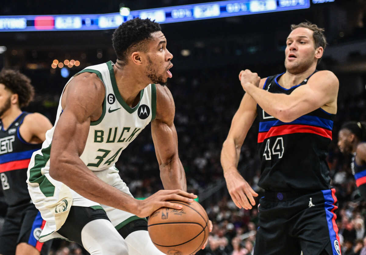 Nov 2, 2022; Milwaukee, Wisconsin, USA;  Milwaukee Bucks forward Giannis Antetokounmpo (34) looks to shoot against Detroit Pistons forward Bojan Bogdanovic (44) in the first quarter at Fiserv Forum. Mandatory Credit: Benny Sieu-USA TODAY Sports