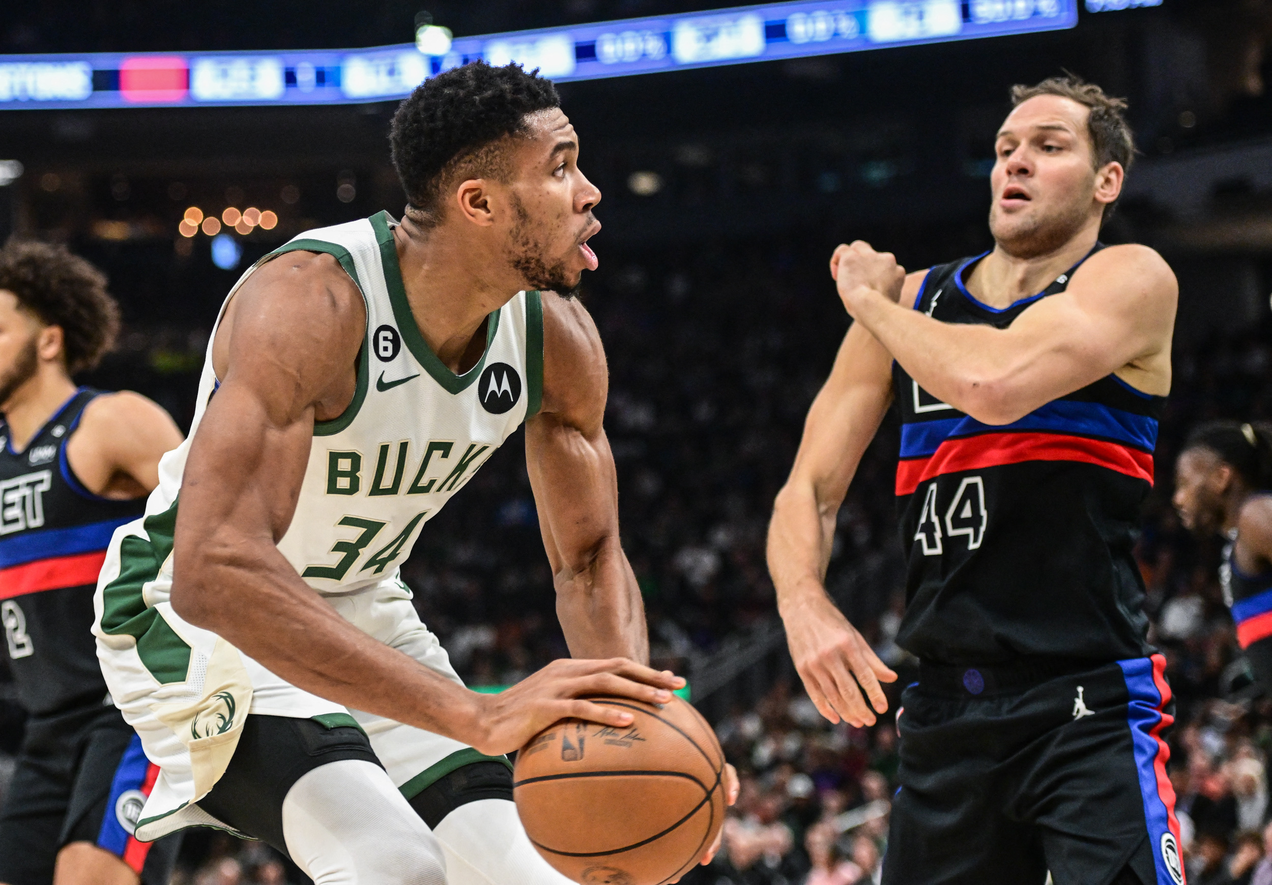 Nov 2, 2022; Milwaukee, Wisconsin, USA;  Milwaukee Bucks forward Giannis Antetokounmpo (34) looks to shoot against Detroit Pistons forward Bojan Bogdanovic (44) in the first quarter at Fiserv Forum. Mandatory Credit: Benny Sieu-USA TODAY Sports