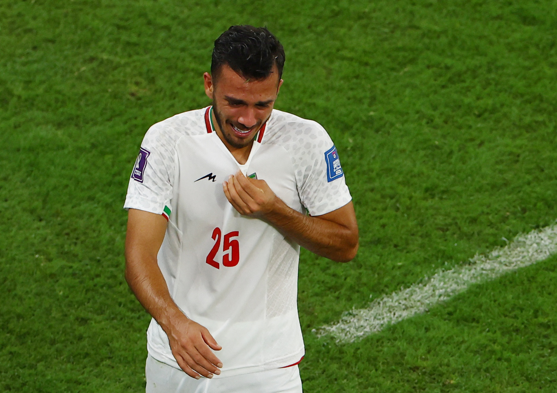 Soccer Football - FIFA World Cup Qatar 2022 - Group B - Iran v United States - Al Thumama Stadium, Doha, Qatar - November 30, 2022 Iran's Abolfazl Jalali looks dejected after being eliminated from the World Cup REUTERS